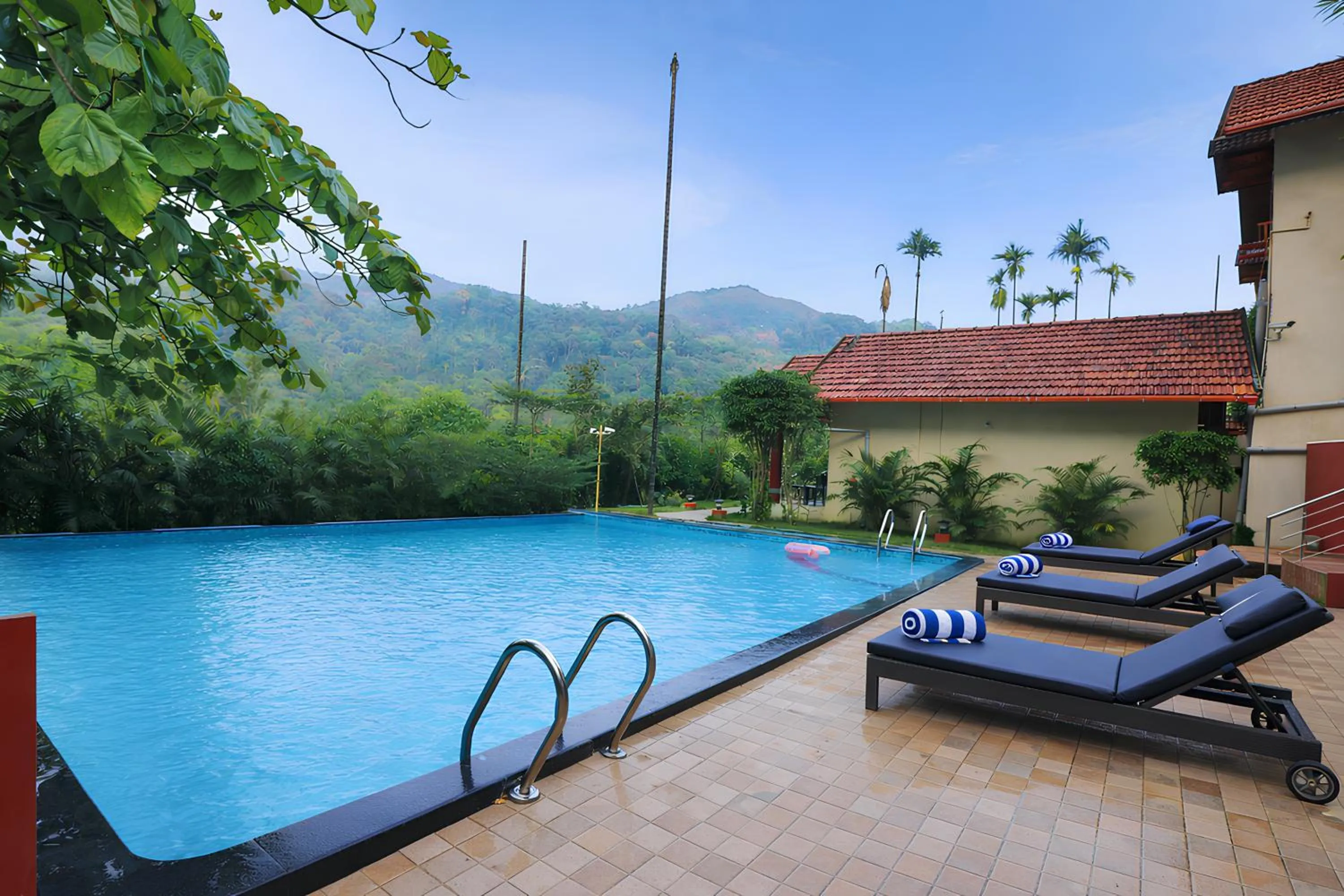 Swimming pool in Hill Crest Resort - Coorg