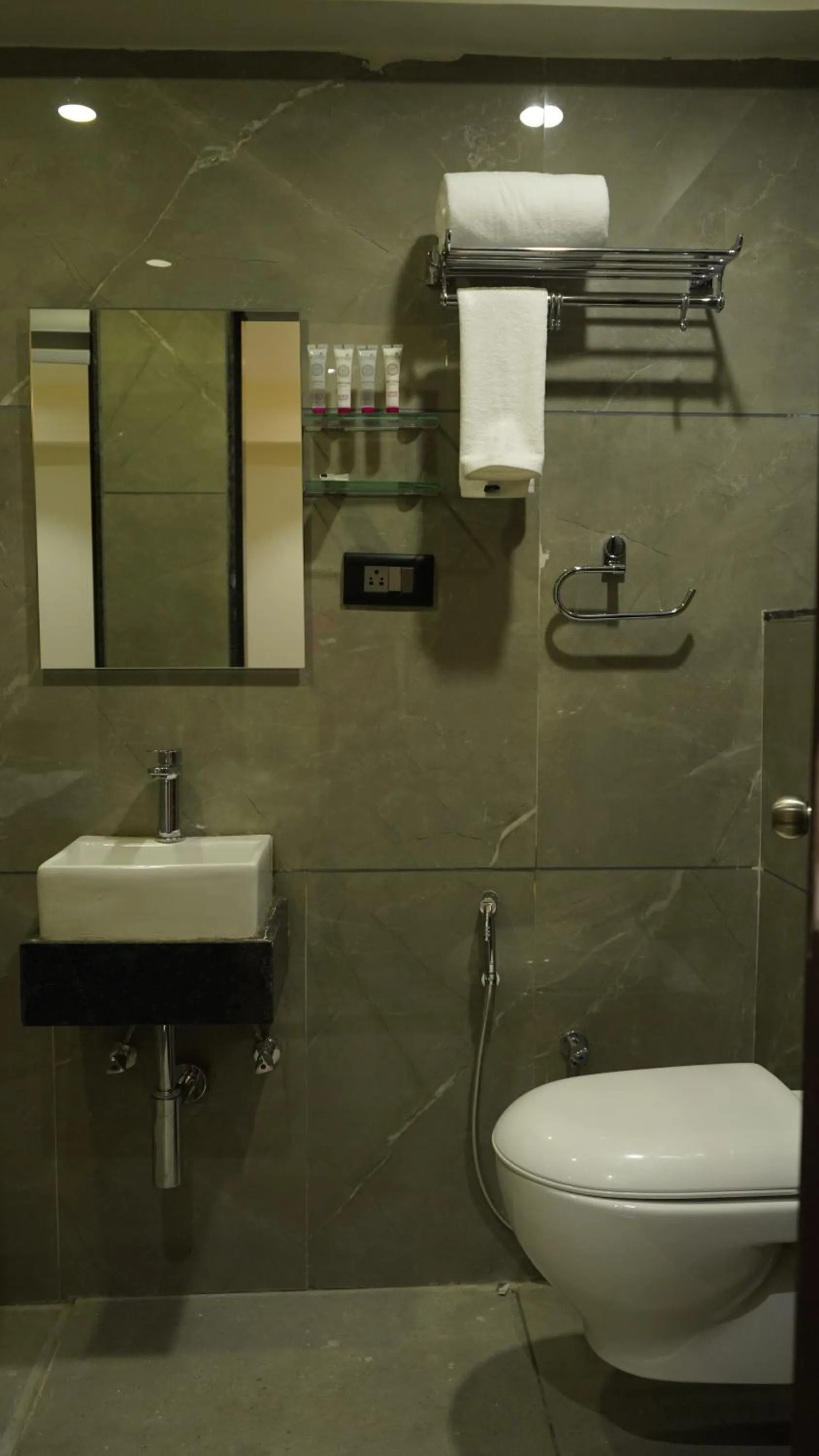 Bathroom in Purple Beds by VITS Dwarkesh, Surat