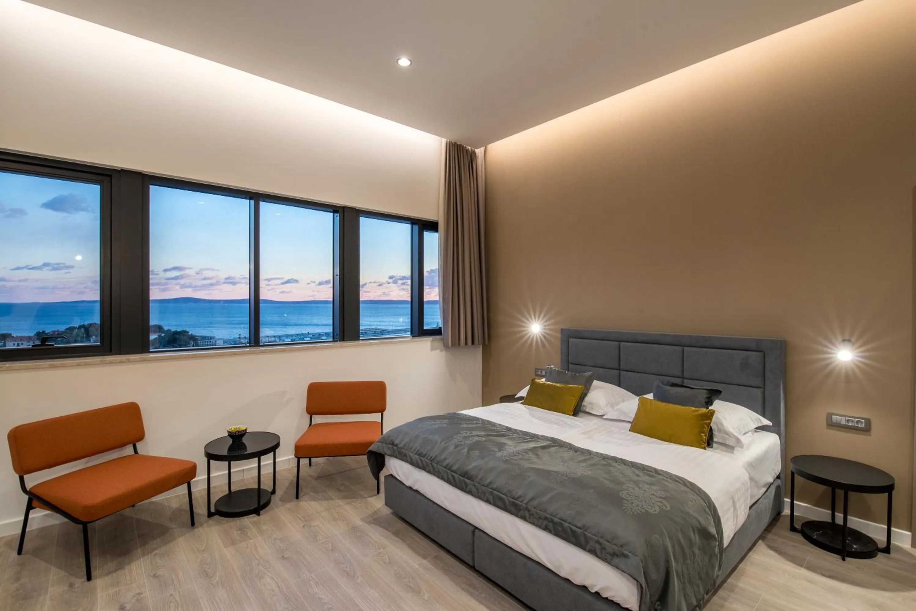 Bed in Seascape Luxury Rooms