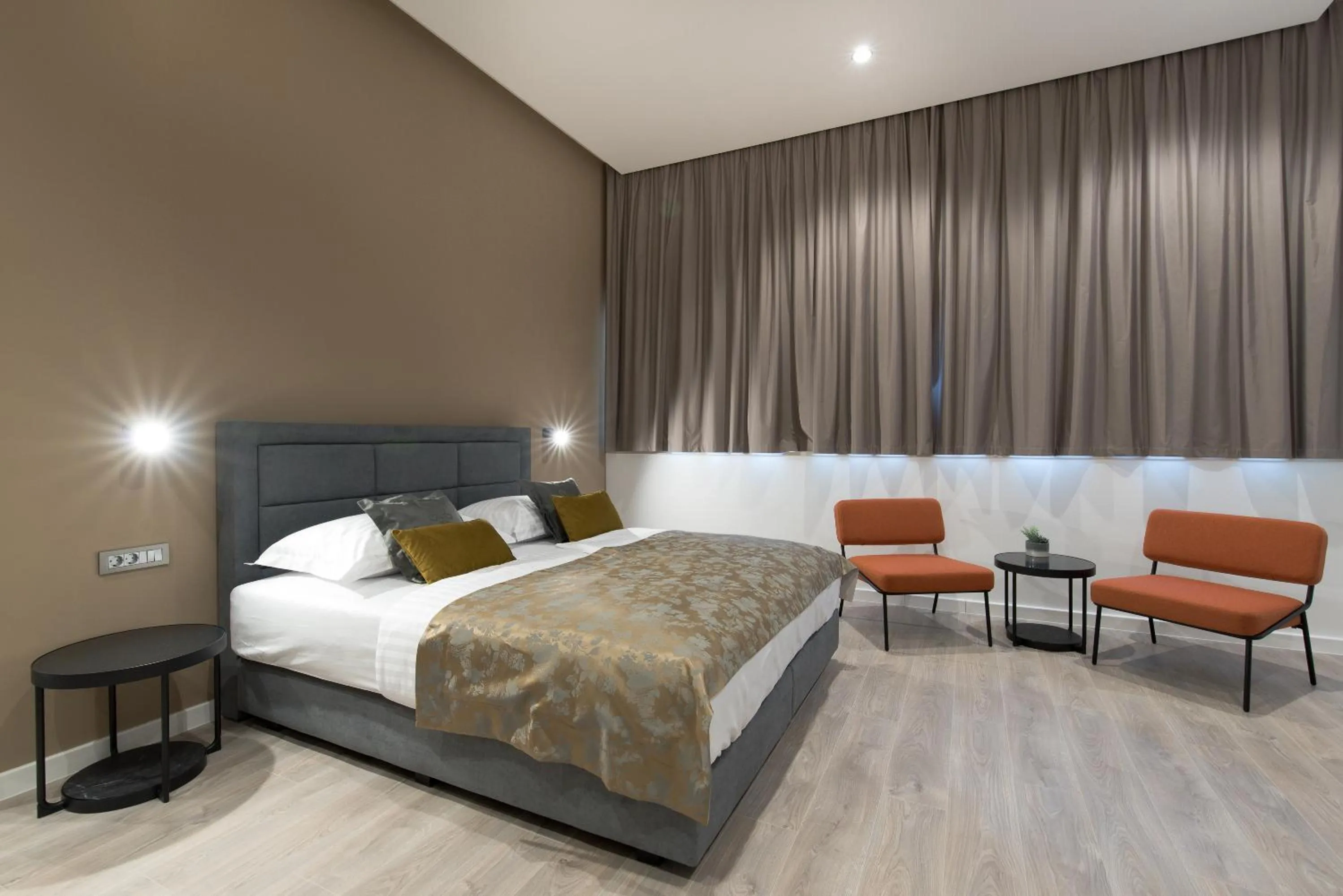 Bed in Seascape Luxury Rooms