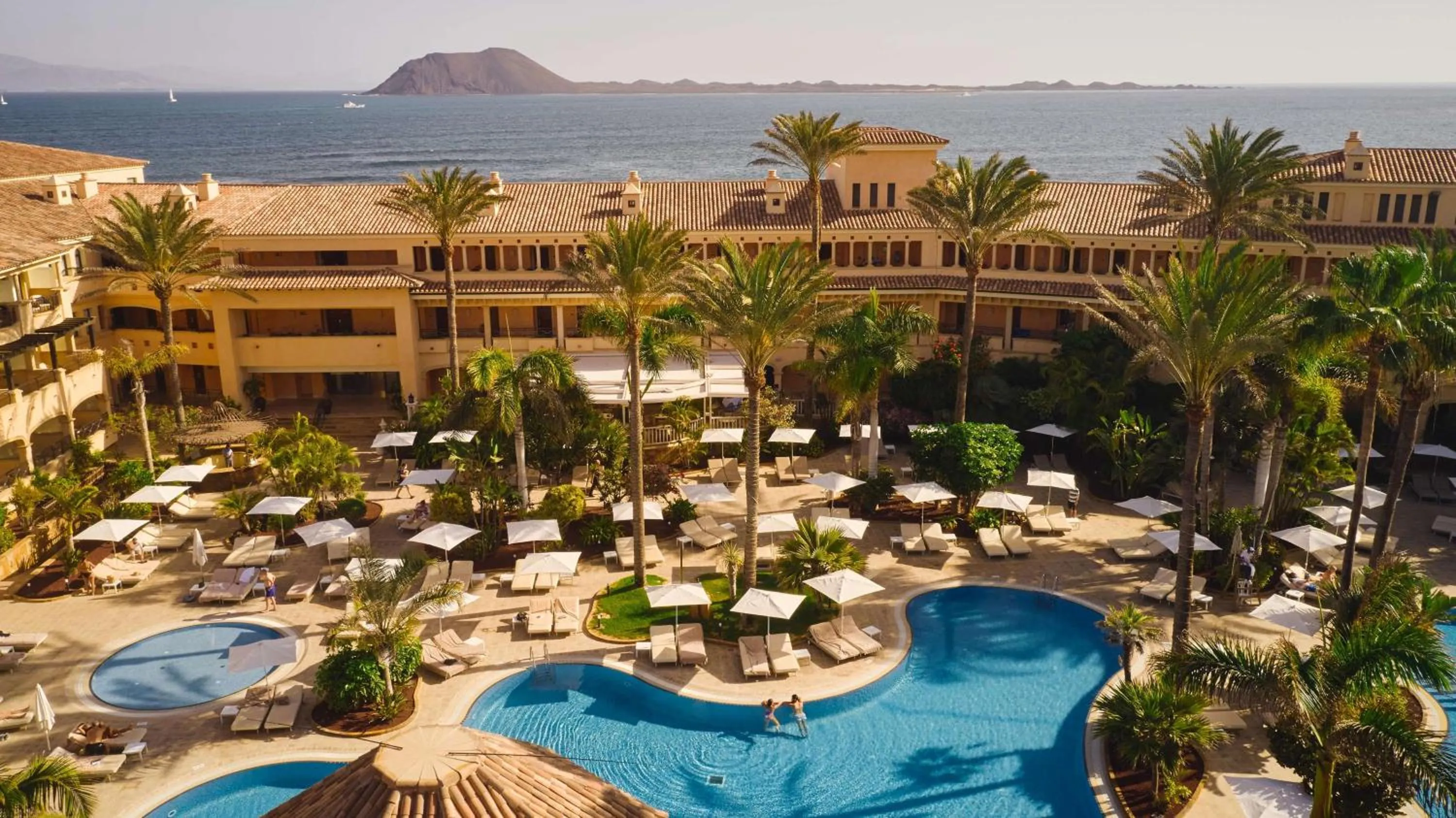 Swimming pool in Secrets Bahía Real Resort & Spa Adults only