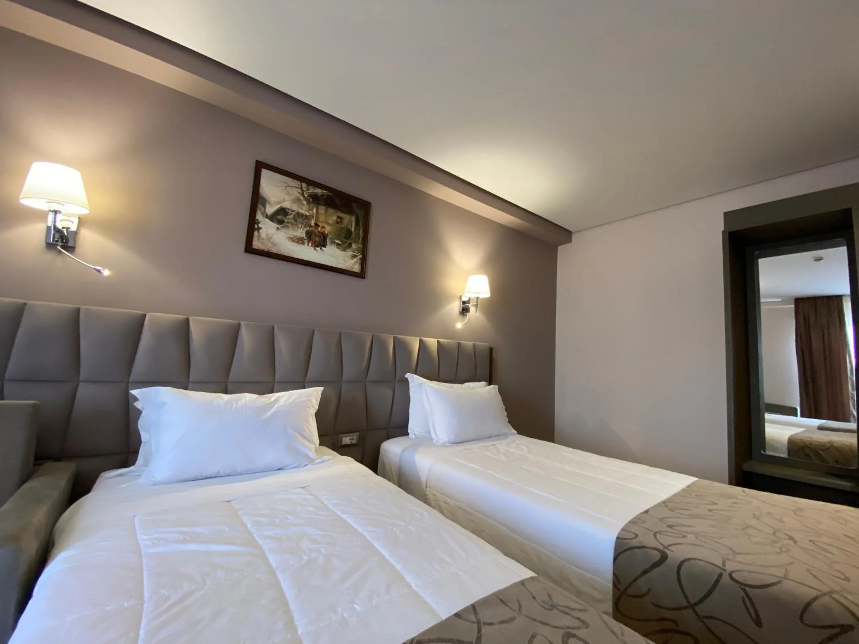 Bed in Doanesia Premium Hotel & Spa