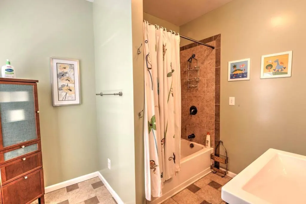 Bathroom in Spacious Row Home next Transit near Downtown w Parking