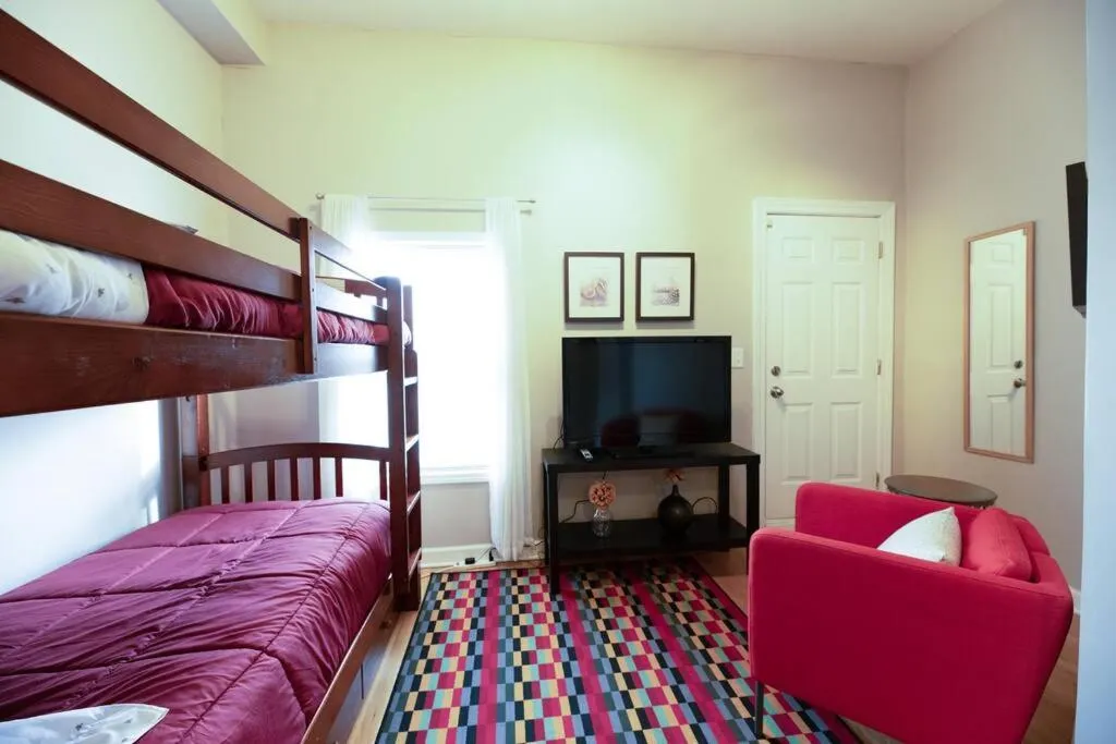 Living room, Bed in Spacious Row Home next Transit near Downtown w Parking