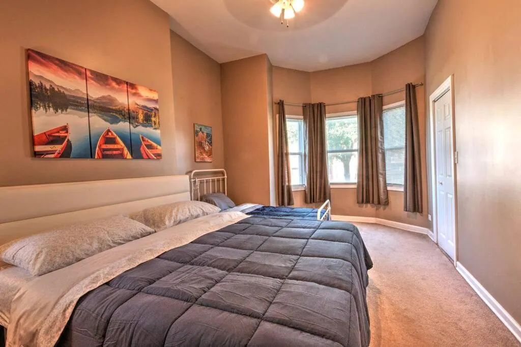 Bedroom, Bed in Spacious Row Home next Transit near Downtown w Parking