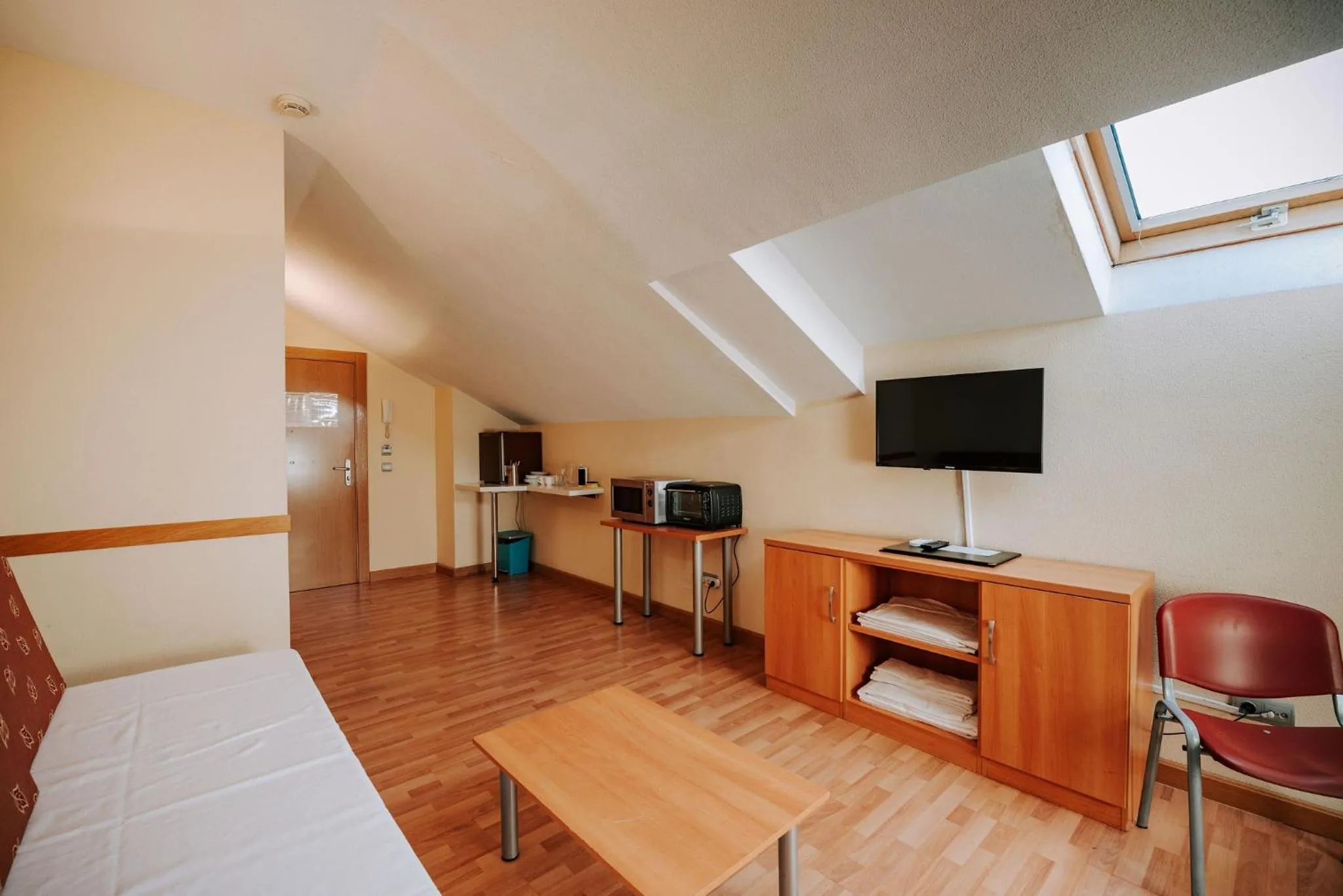 Living room, Bed in JCH Congreso Apartamentos