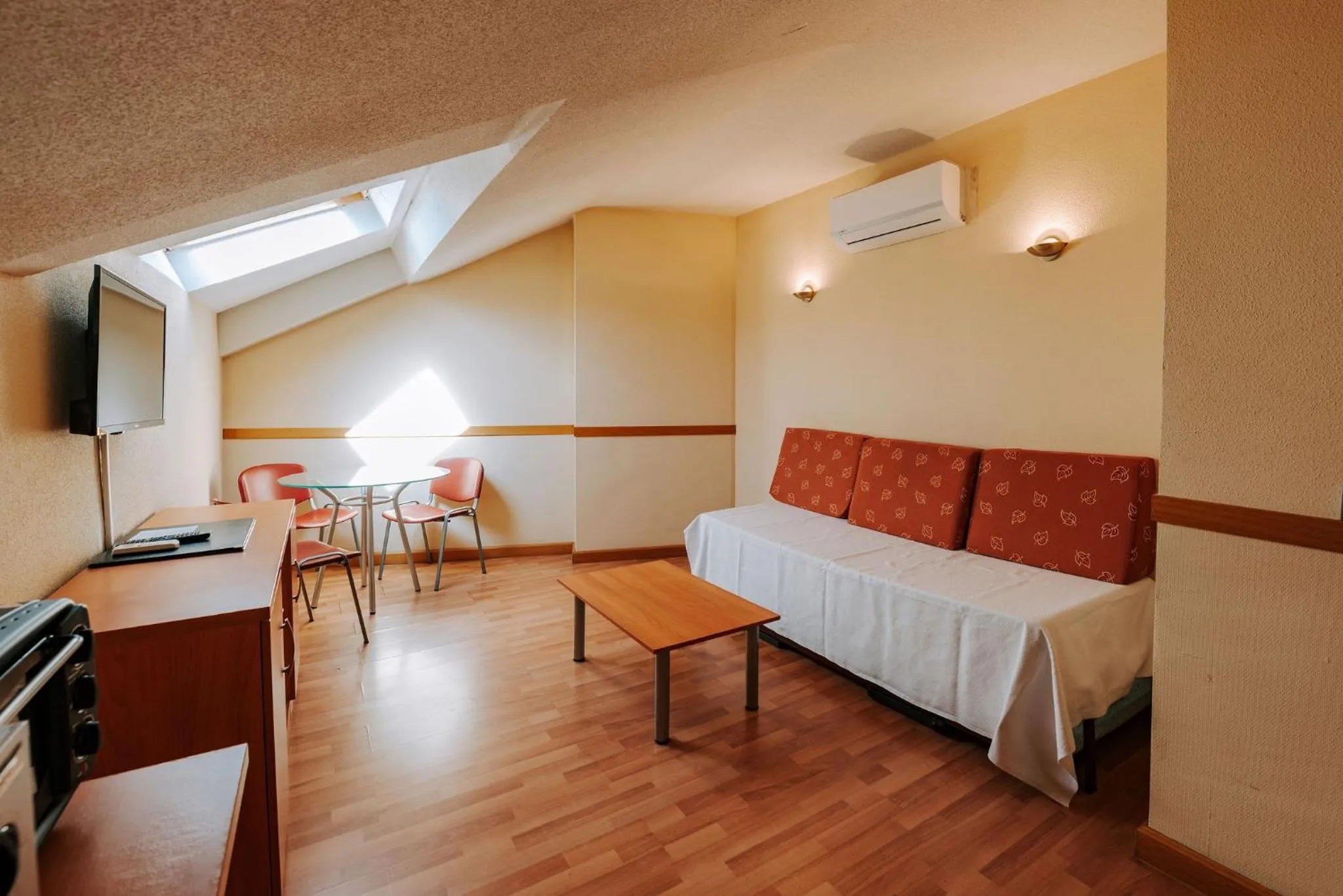 Seating area, Bed in JCH Congreso Apartamentos