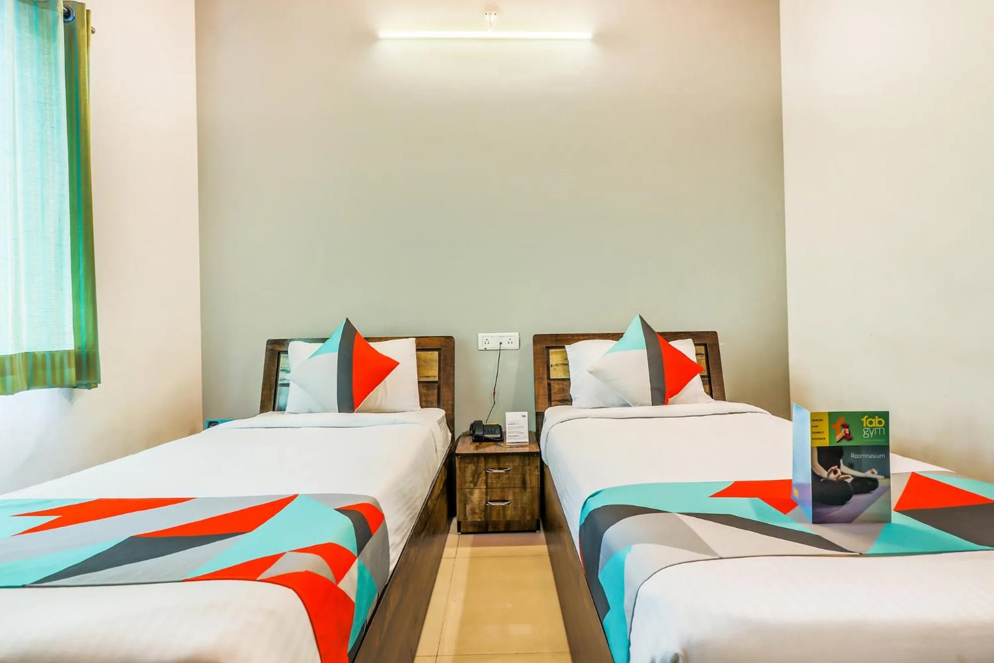Bed in FabHotel Diamond Residency - Airport road