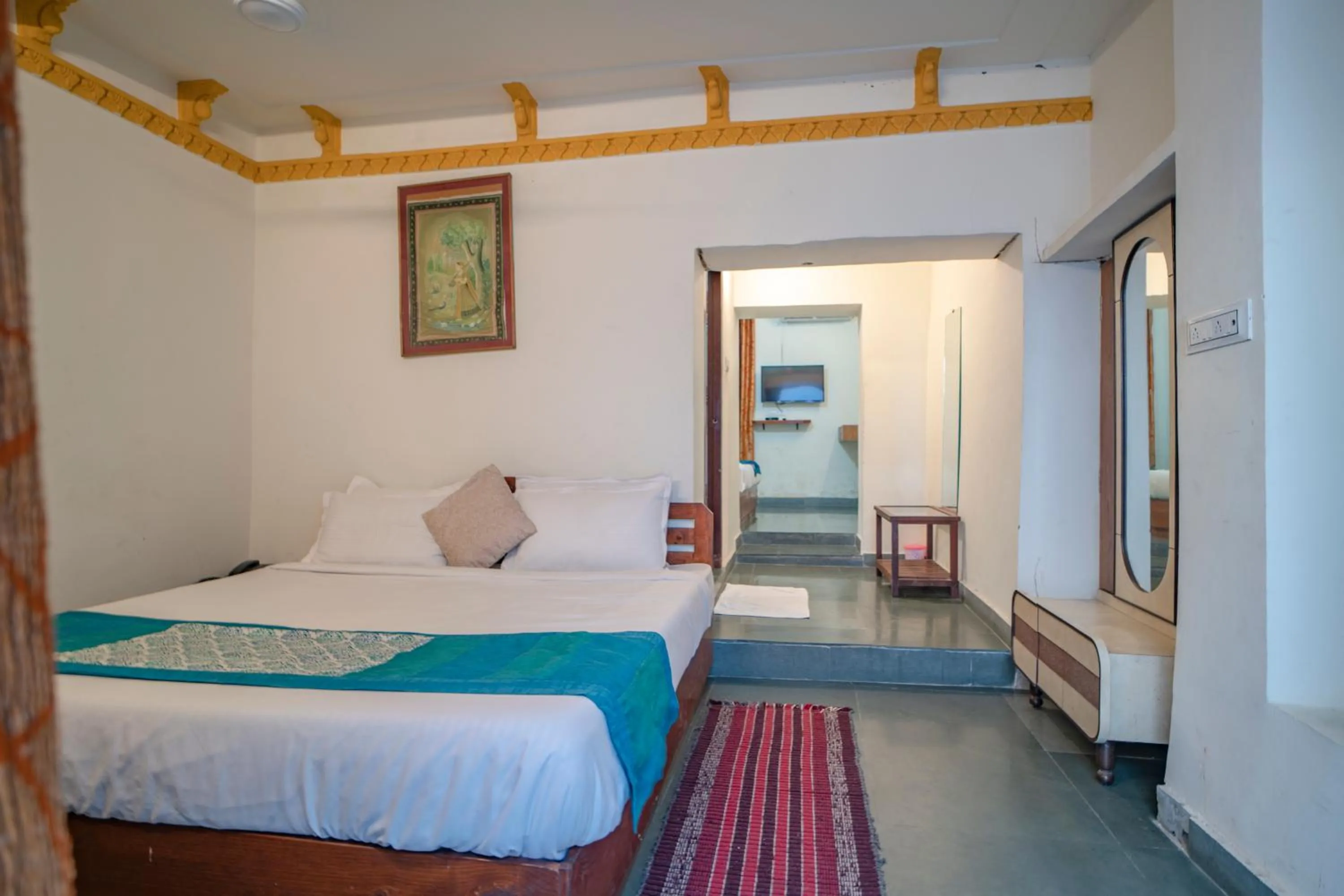 Bed in Hotel Ambavgarh Palace