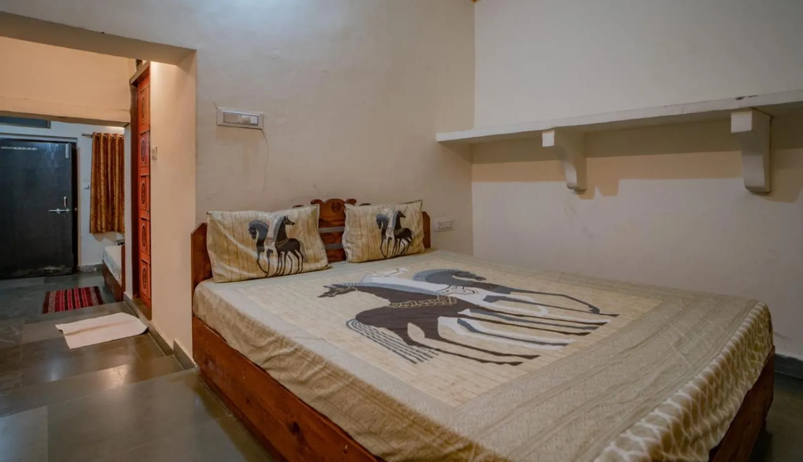 Bed in Hotel Ambavgarh Palace