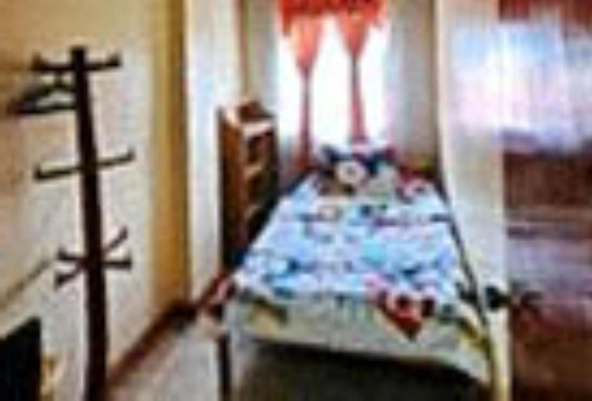 Double Room with Shared Bathroom in RedDoorz Hostel @ Faes Transient House
