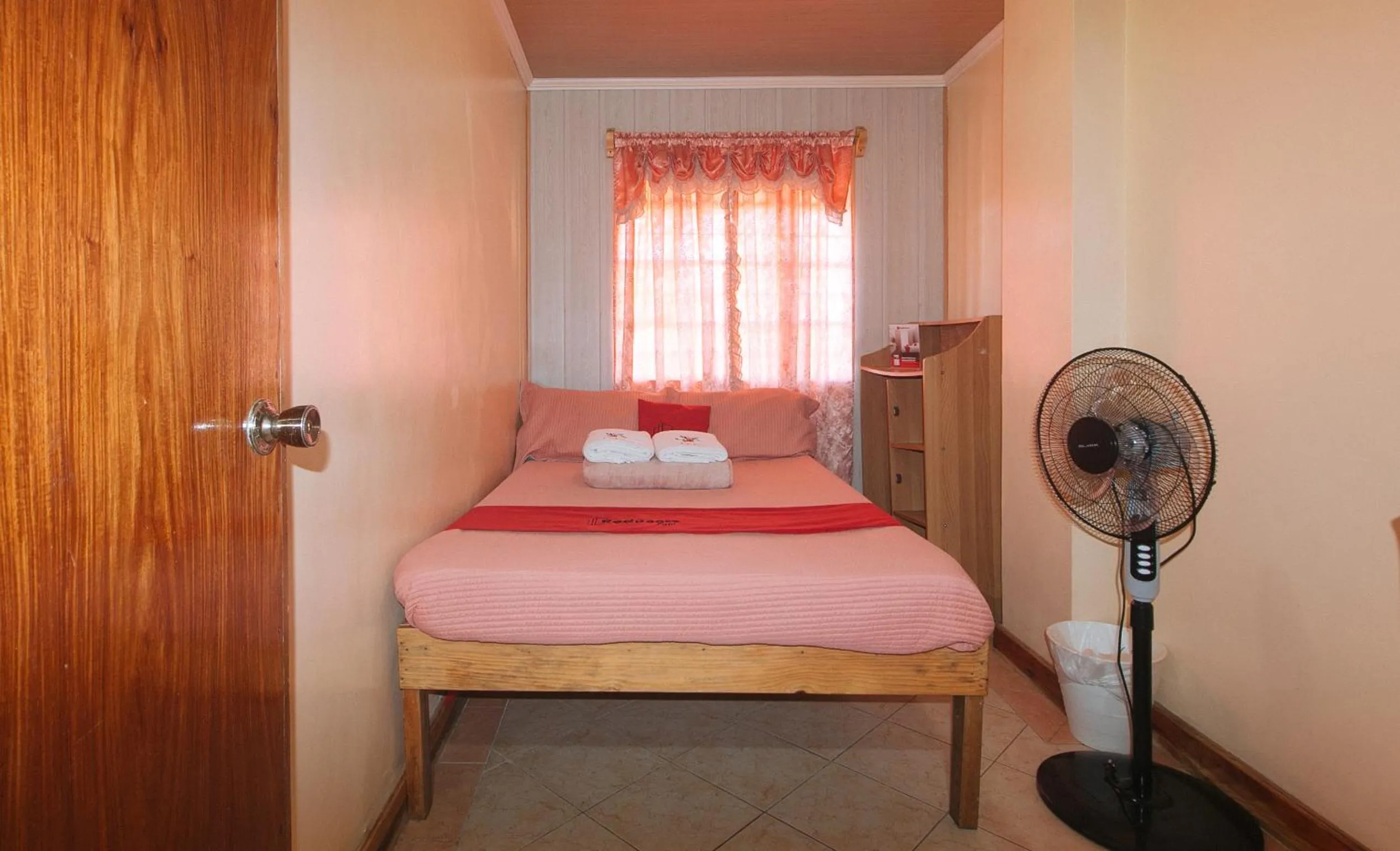 Photo of the whole room, Bed in RedDoorz Hostel @ Faes Transient House