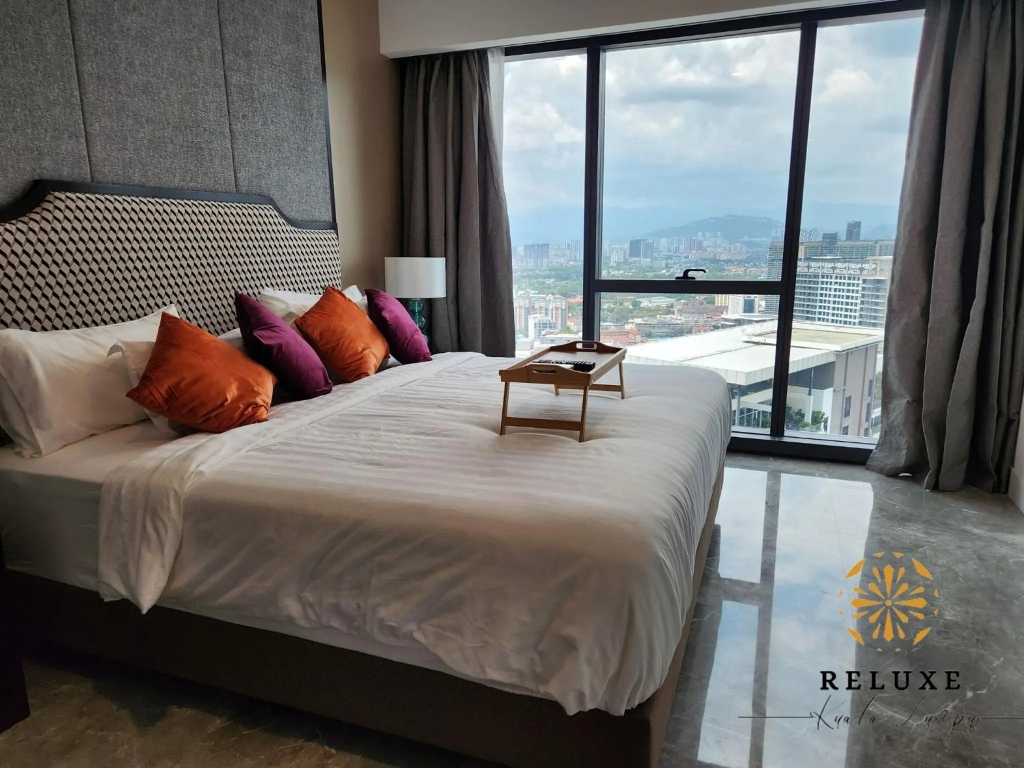 Bed in The Platinum 2 Premium Suite by Reluxe