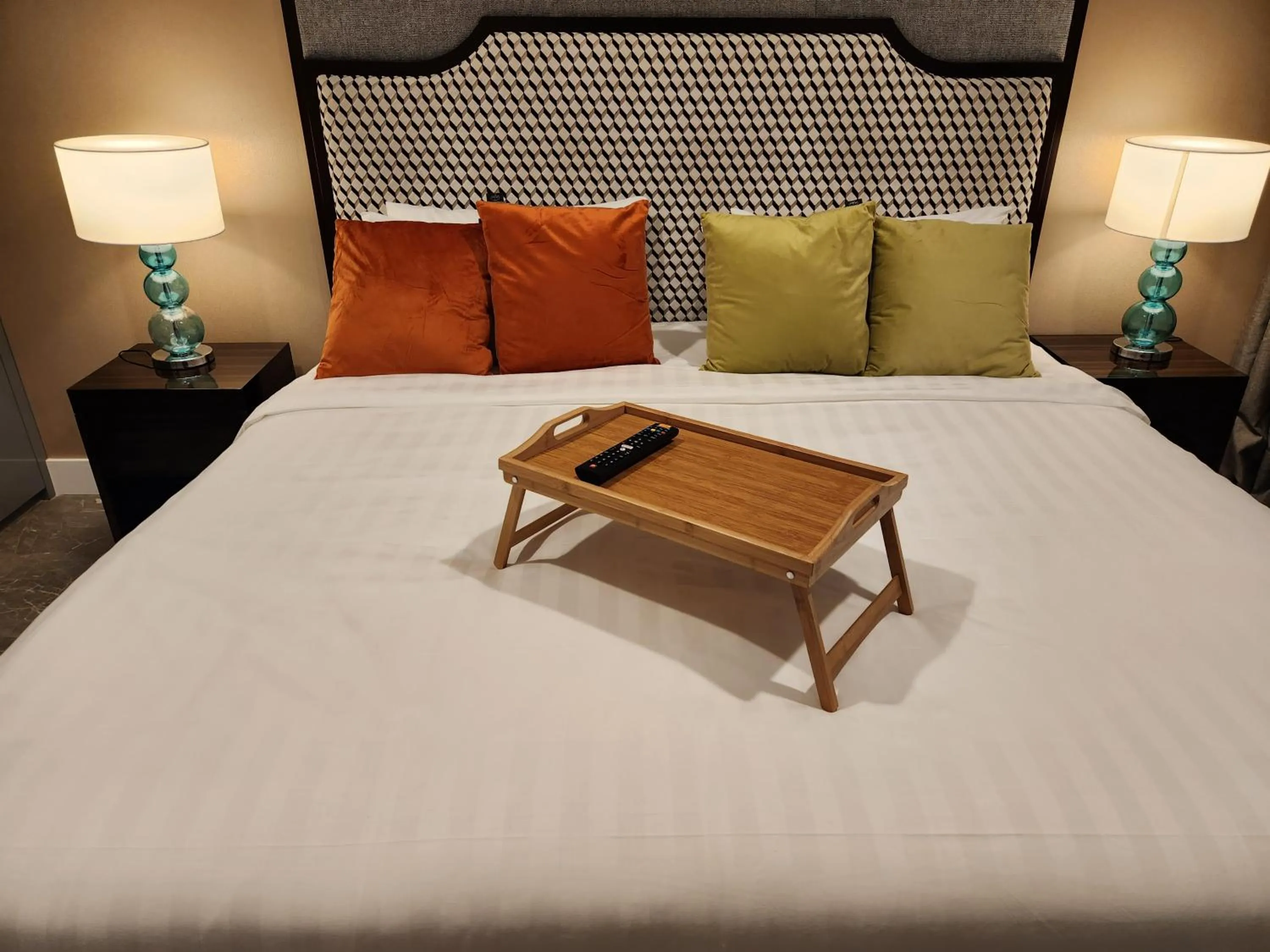 Bed in The Platinum 2 Premium Suite by Reluxe