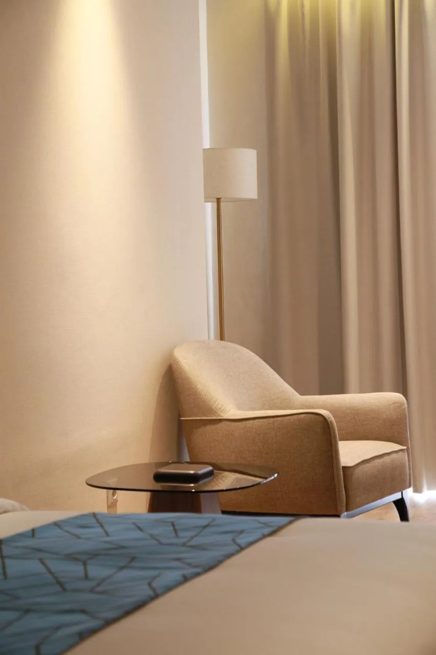 Seating area, Bed in Sofia International Hotel