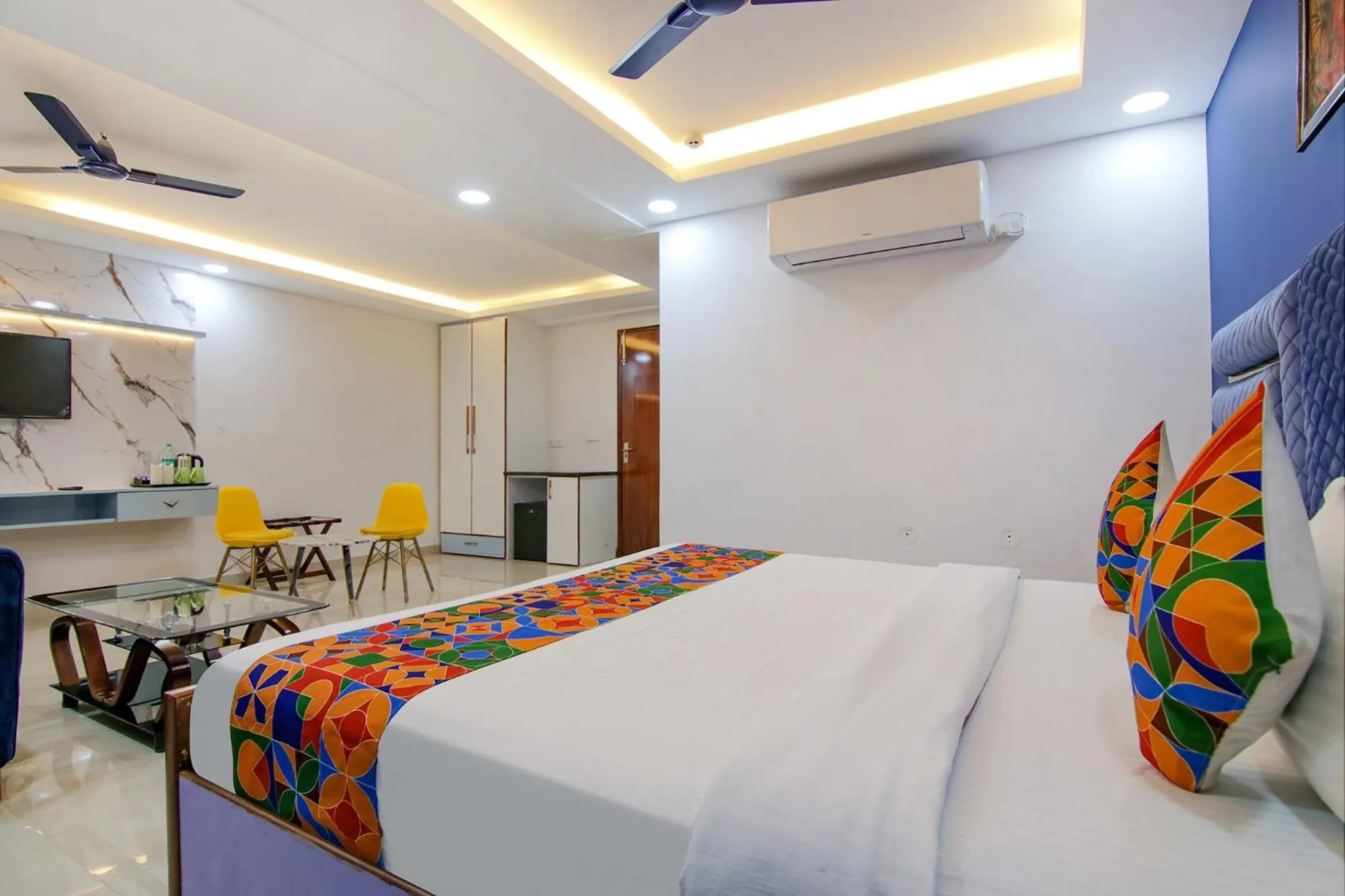 Bed in FabHotel Satyam International