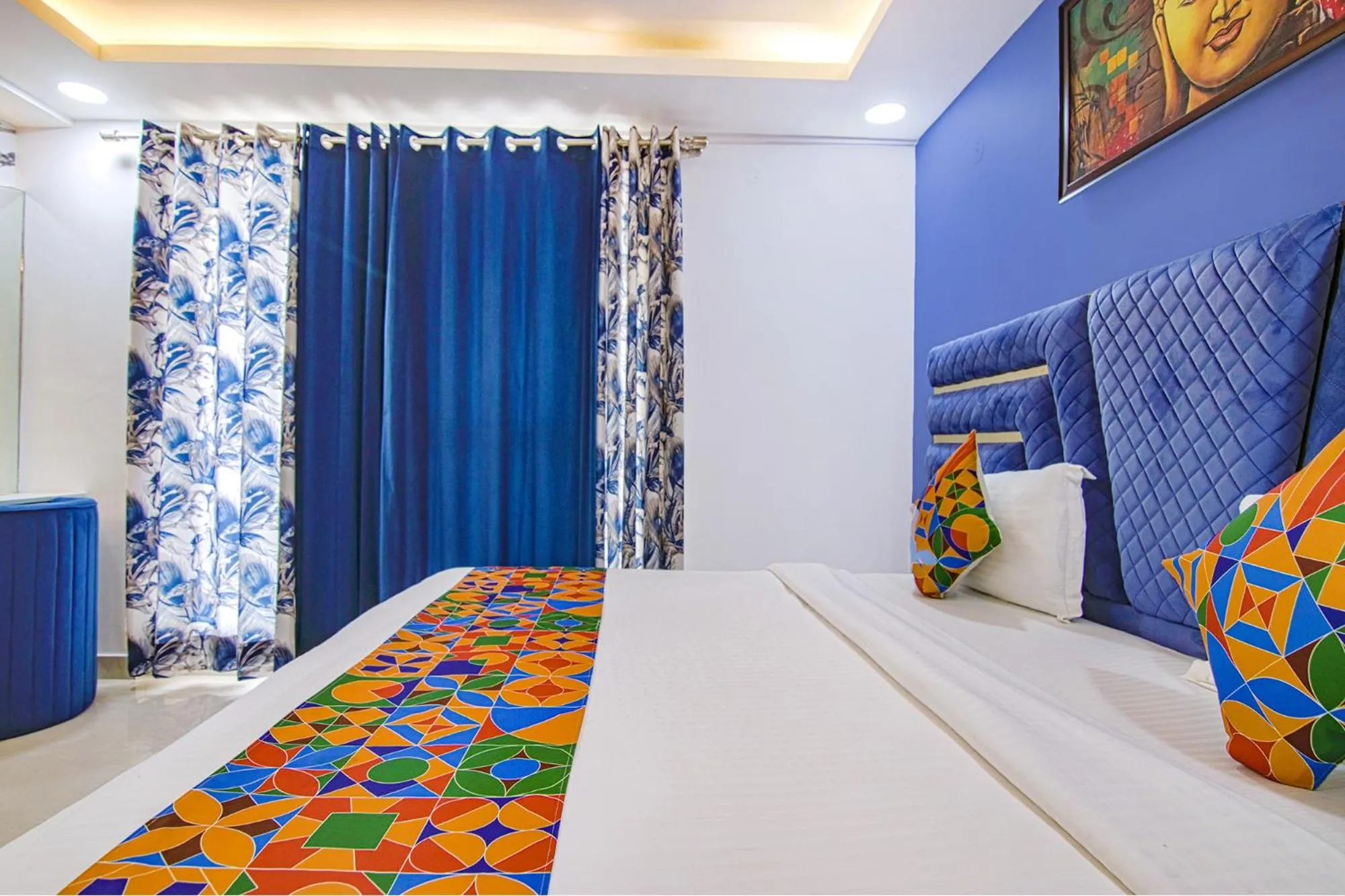 Bed in FabHotel Satyam International