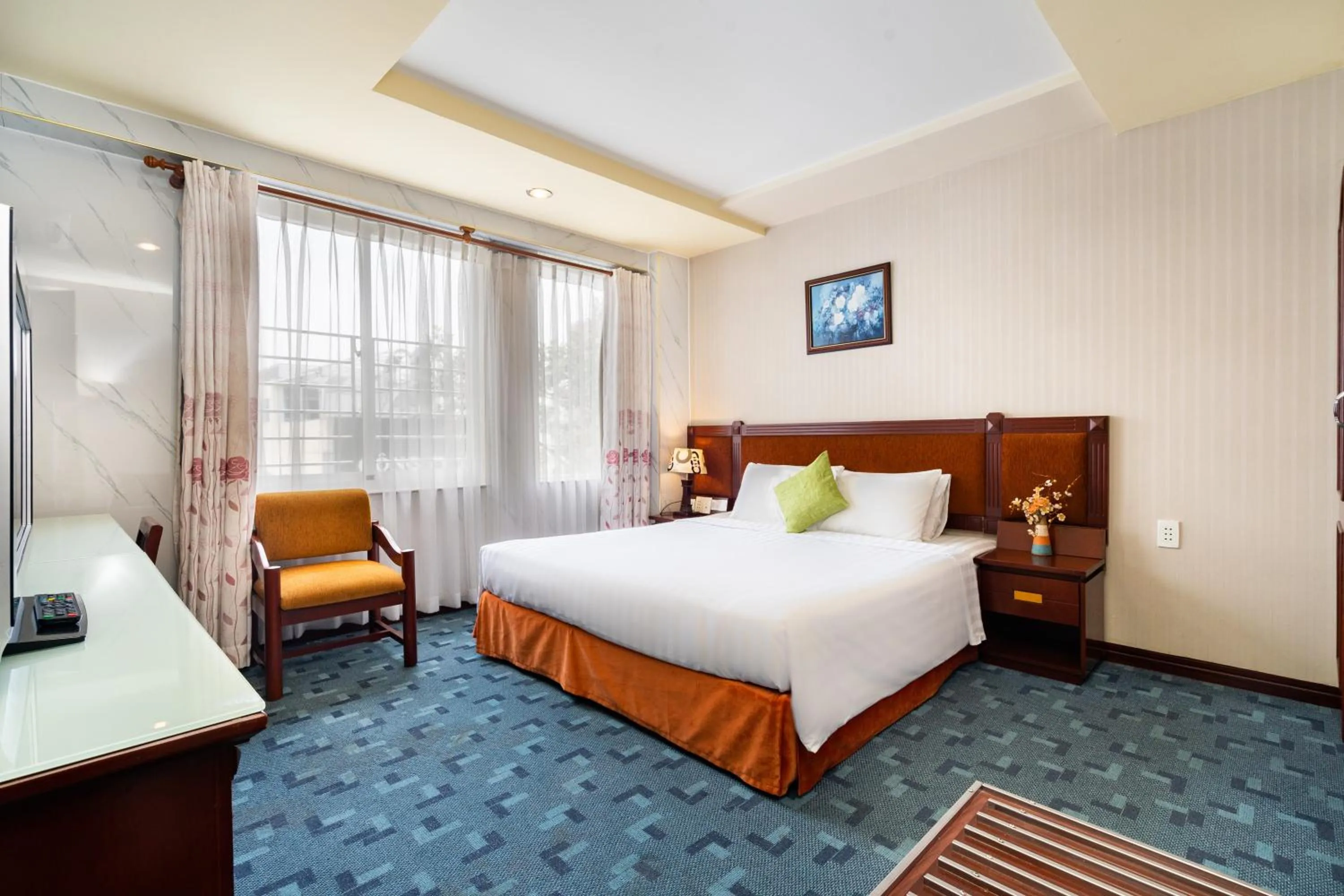 Bed in LUCASTA SAIGON Hotel