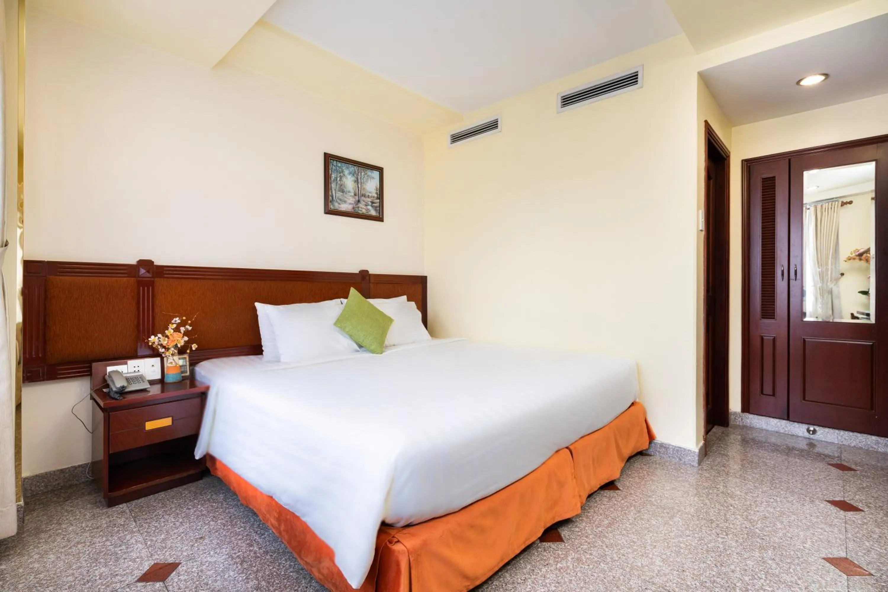 Bed in LUCASTA SAIGON Hotel