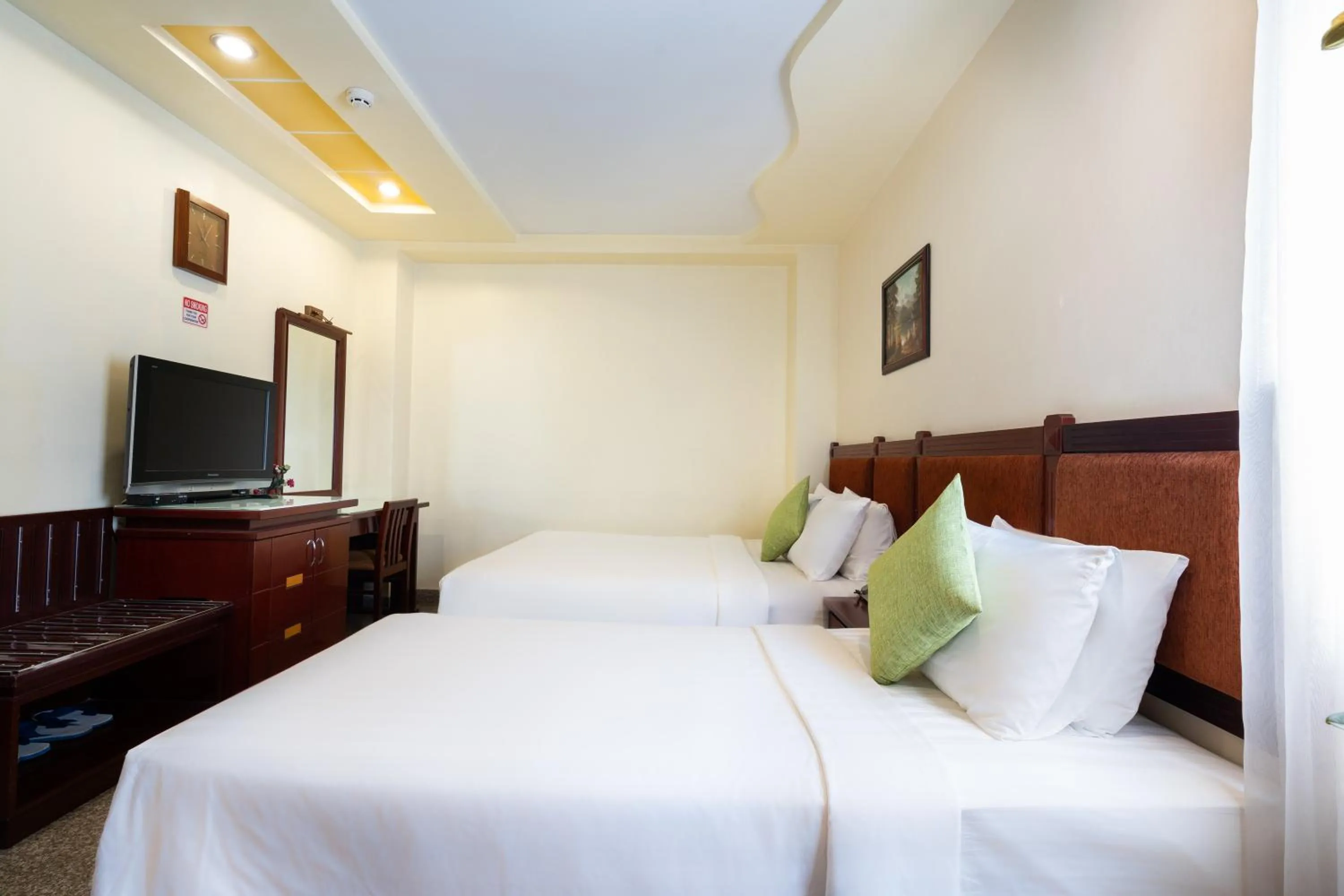 Communal lounge/ TV room, Bed in LUCASTA SAIGON Hotel