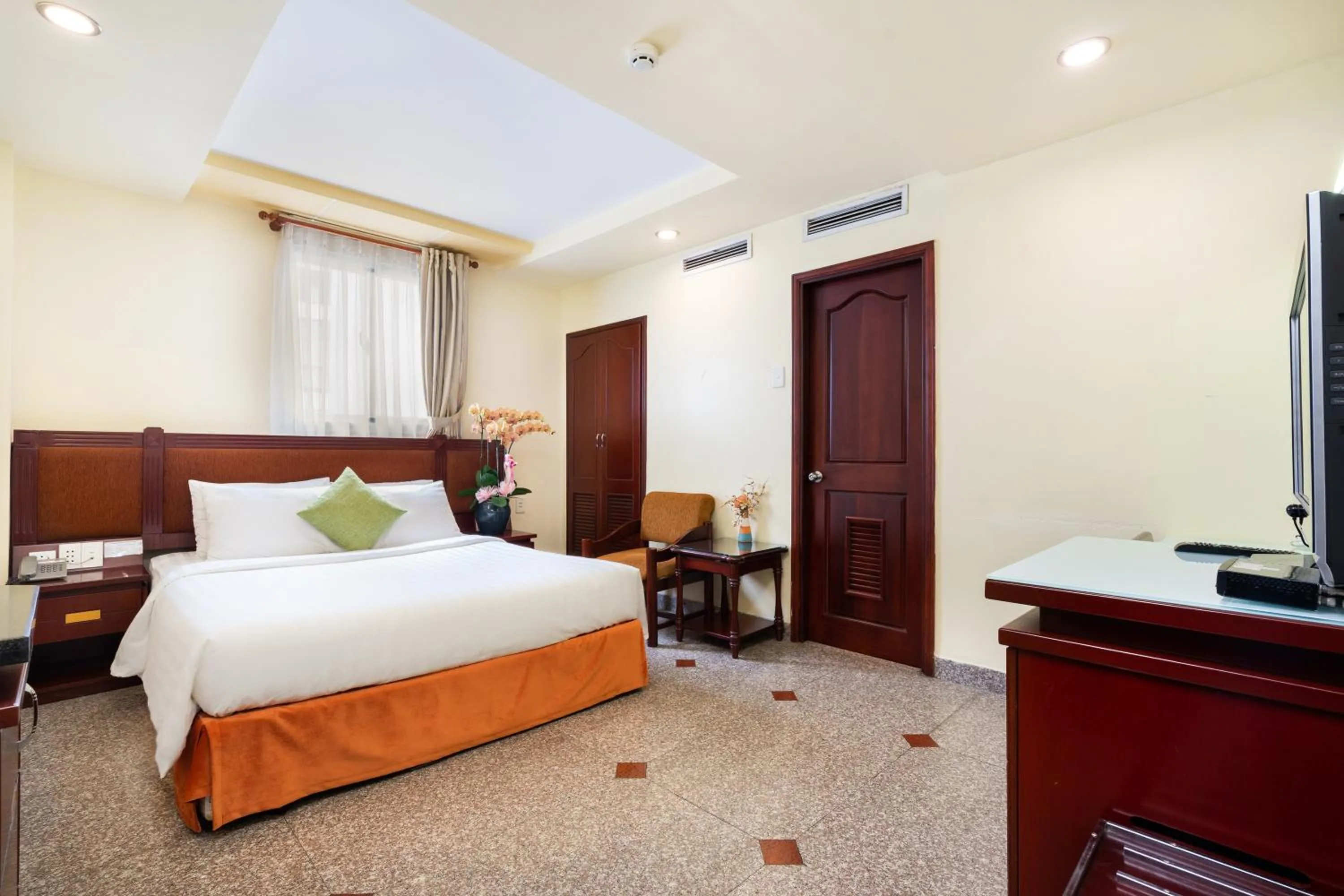 Bed in LUCASTA SAIGON Hotel