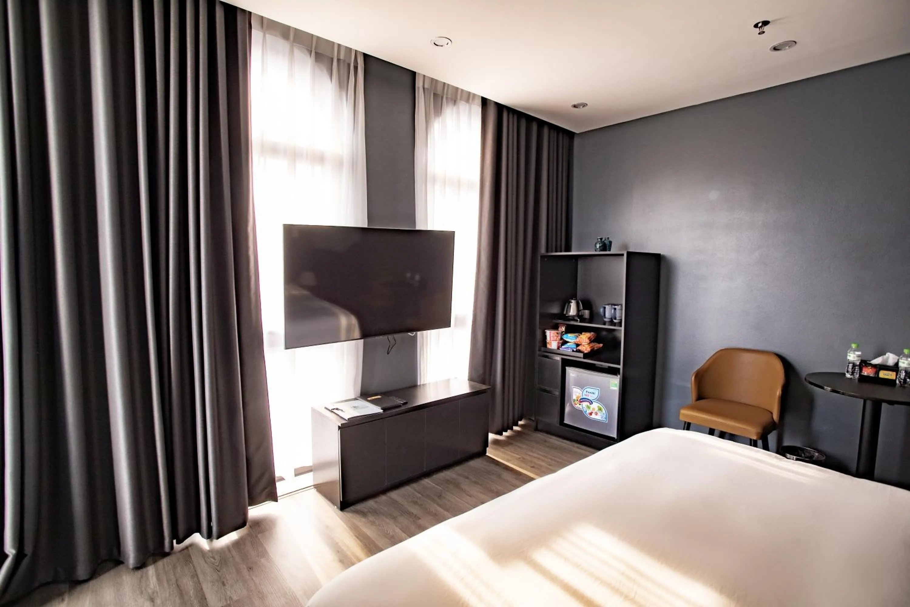 Seating area, Bed in La Maison Boutique Hotel