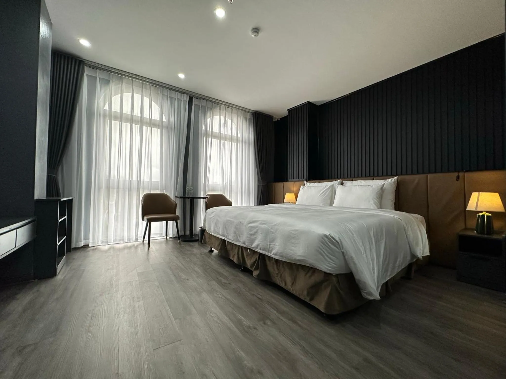 Bed in La Maison Boutique Hotel