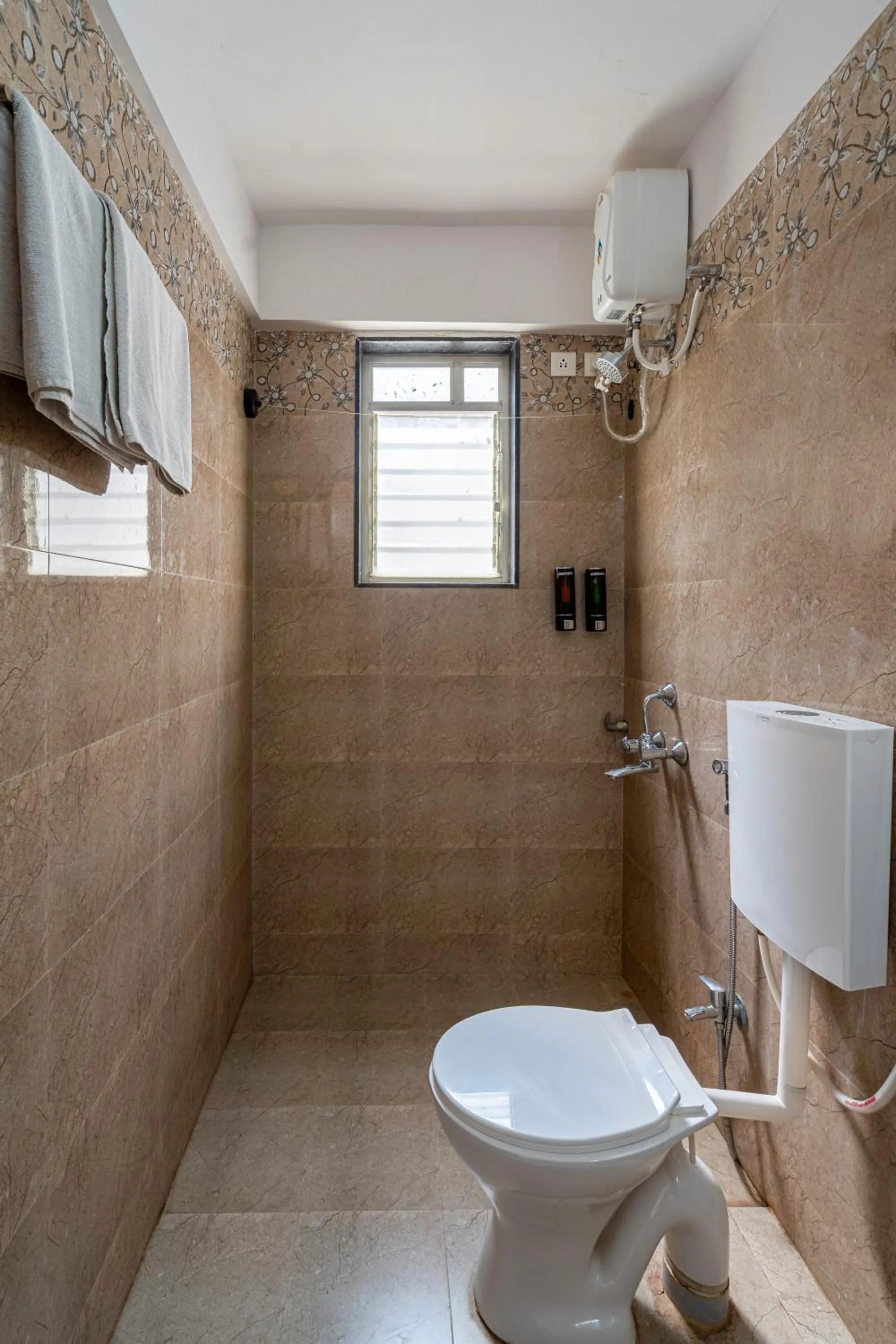 Shower in StayBird - Silver Oak, An Apartment Hotel, Kharadi