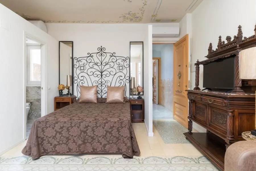 Living room, Bed in El Petit Palauet