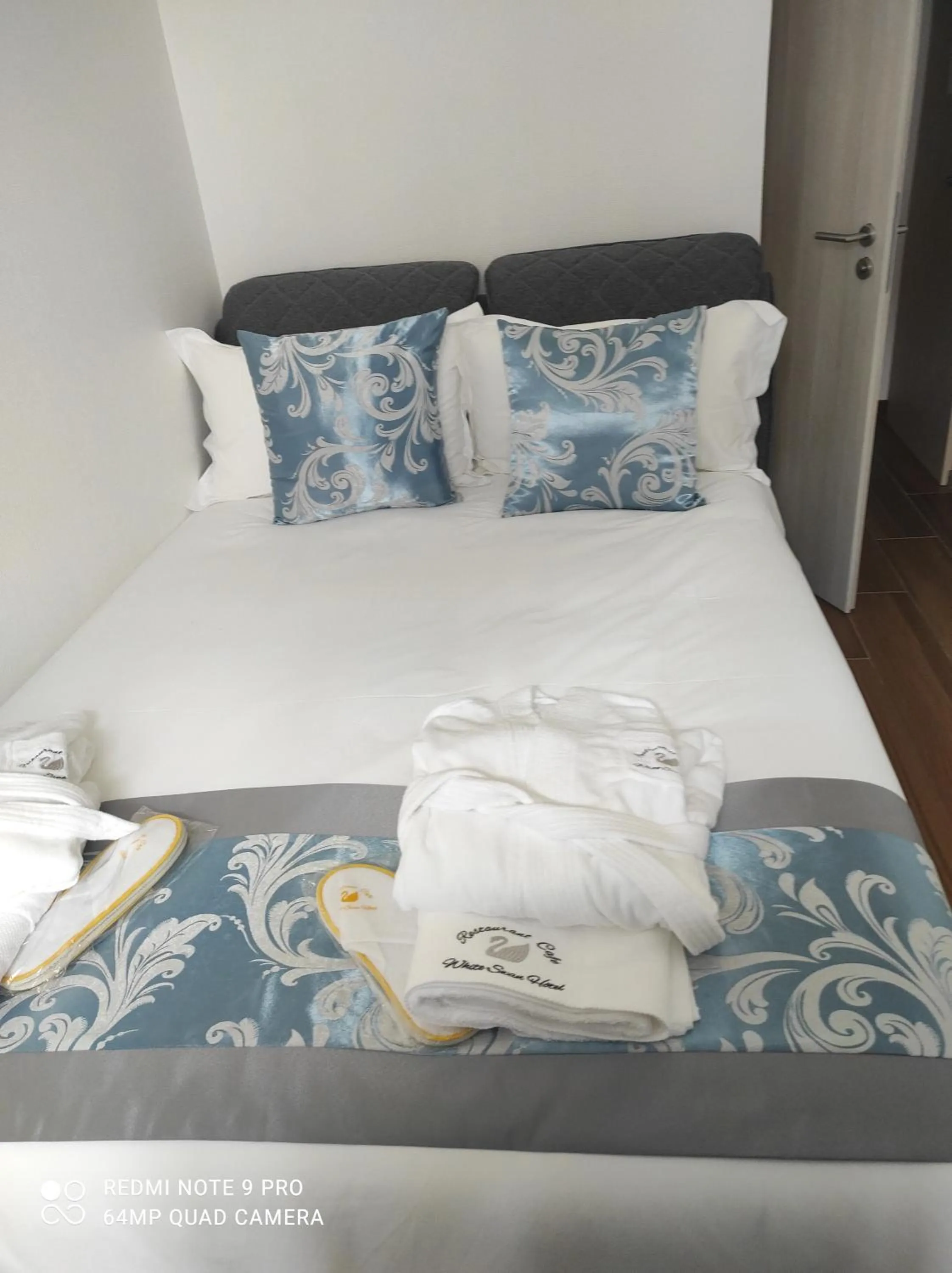 Bed in hotel whiteswan