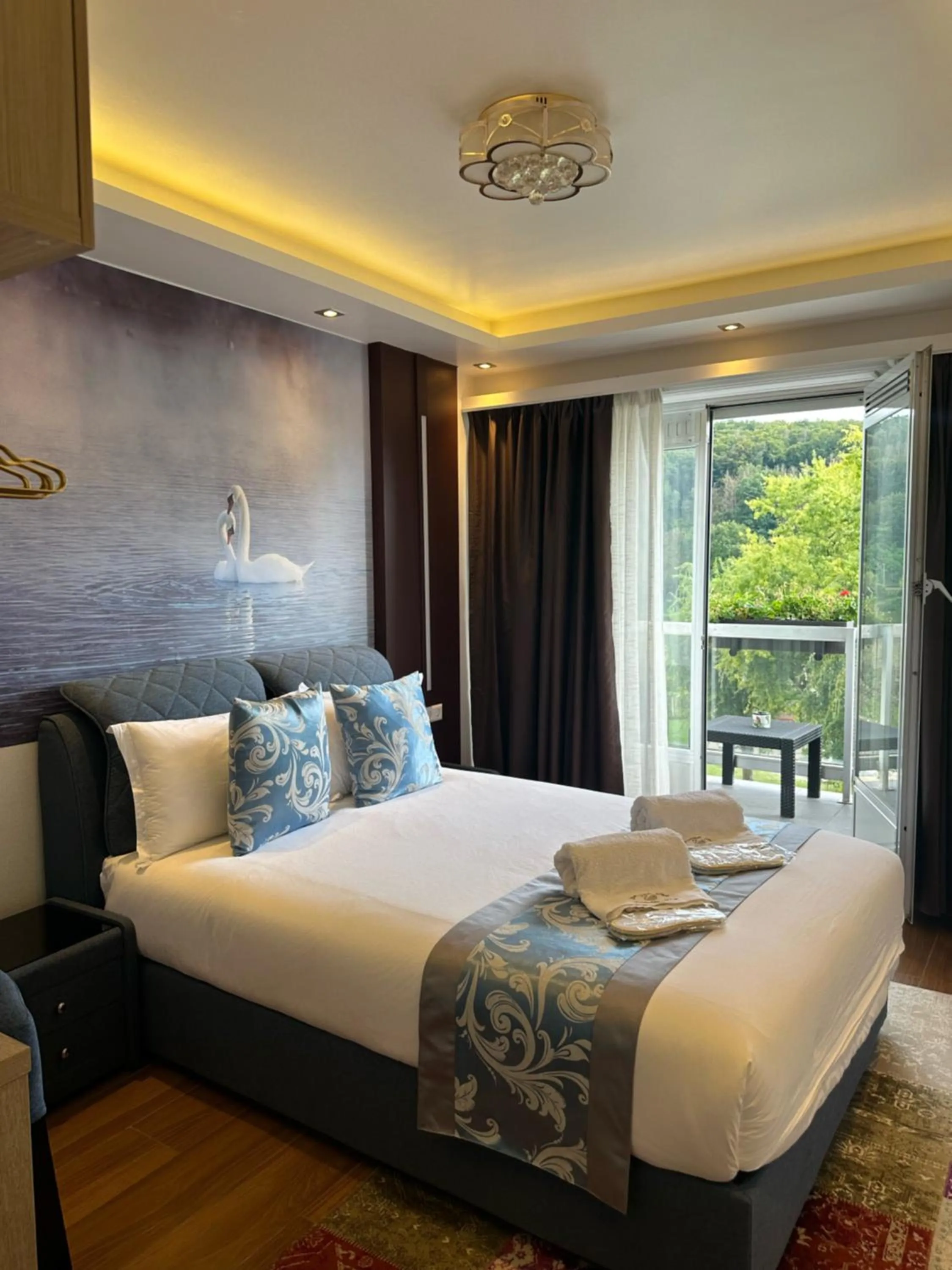 Bed in hotel whiteswan