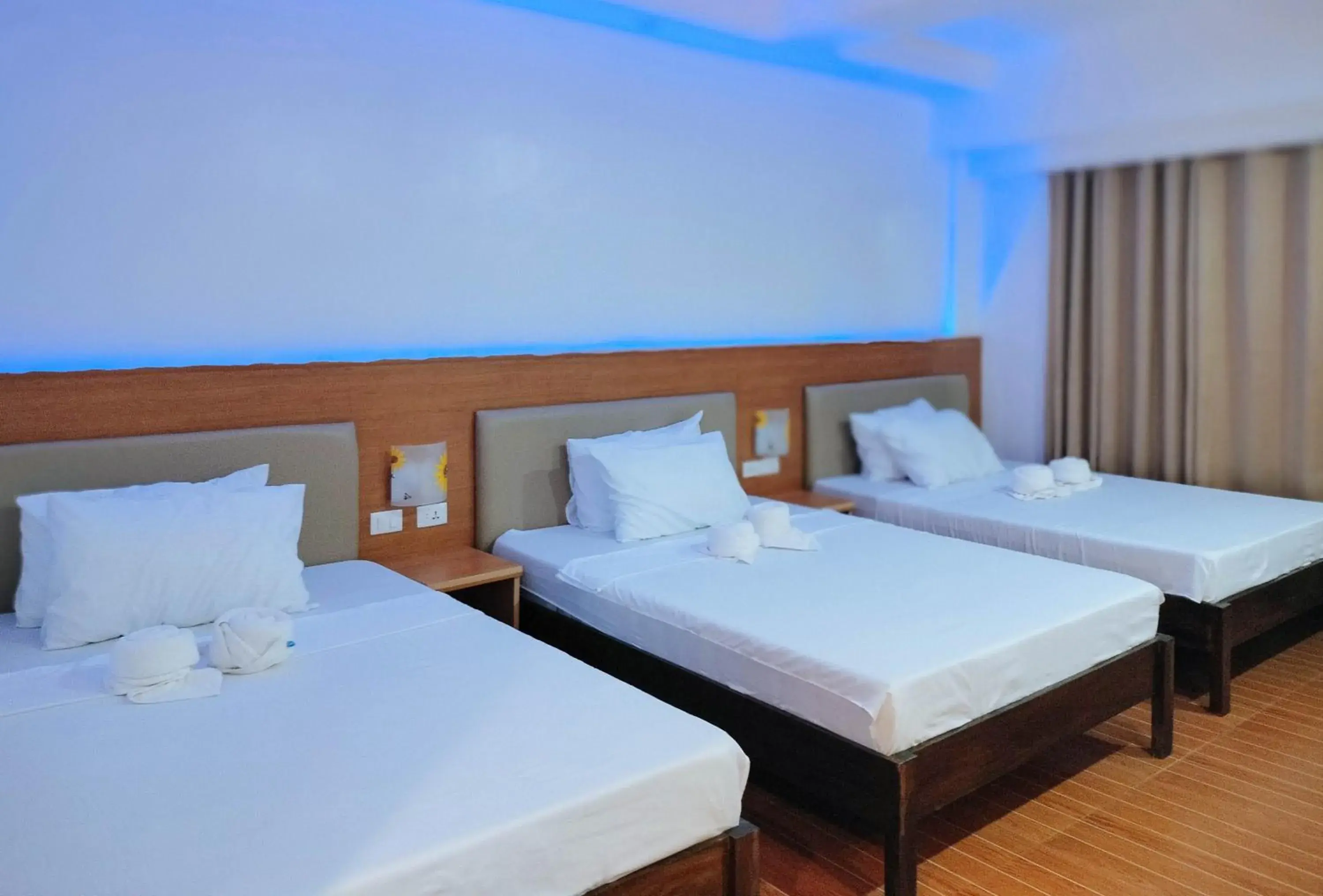 Deluxe Family Room in RedDoorz @ Sun Kissed Resort Guindulman Deluxe Family Room in RedDoorz @ Sun Kissed Resort Guindulman