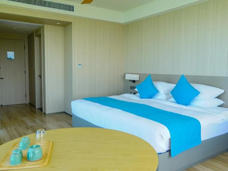 Bed in Palau Sunrise Seaview Landison Retreat