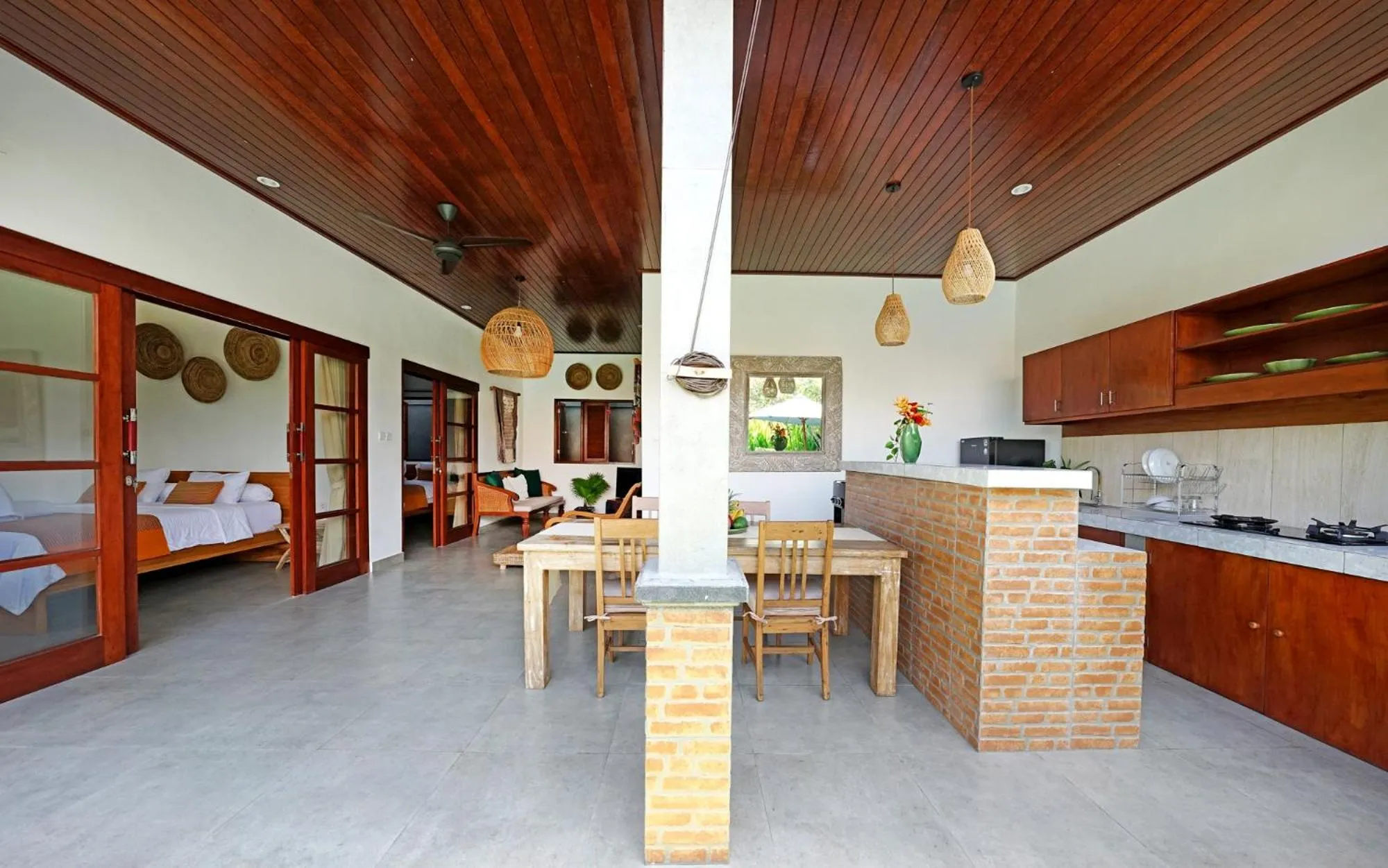 Living room, Kitchen/Kitchenette in The Lavana Villa Kubu Life Kerobokan Seminyak (3 Bedroom Villa)