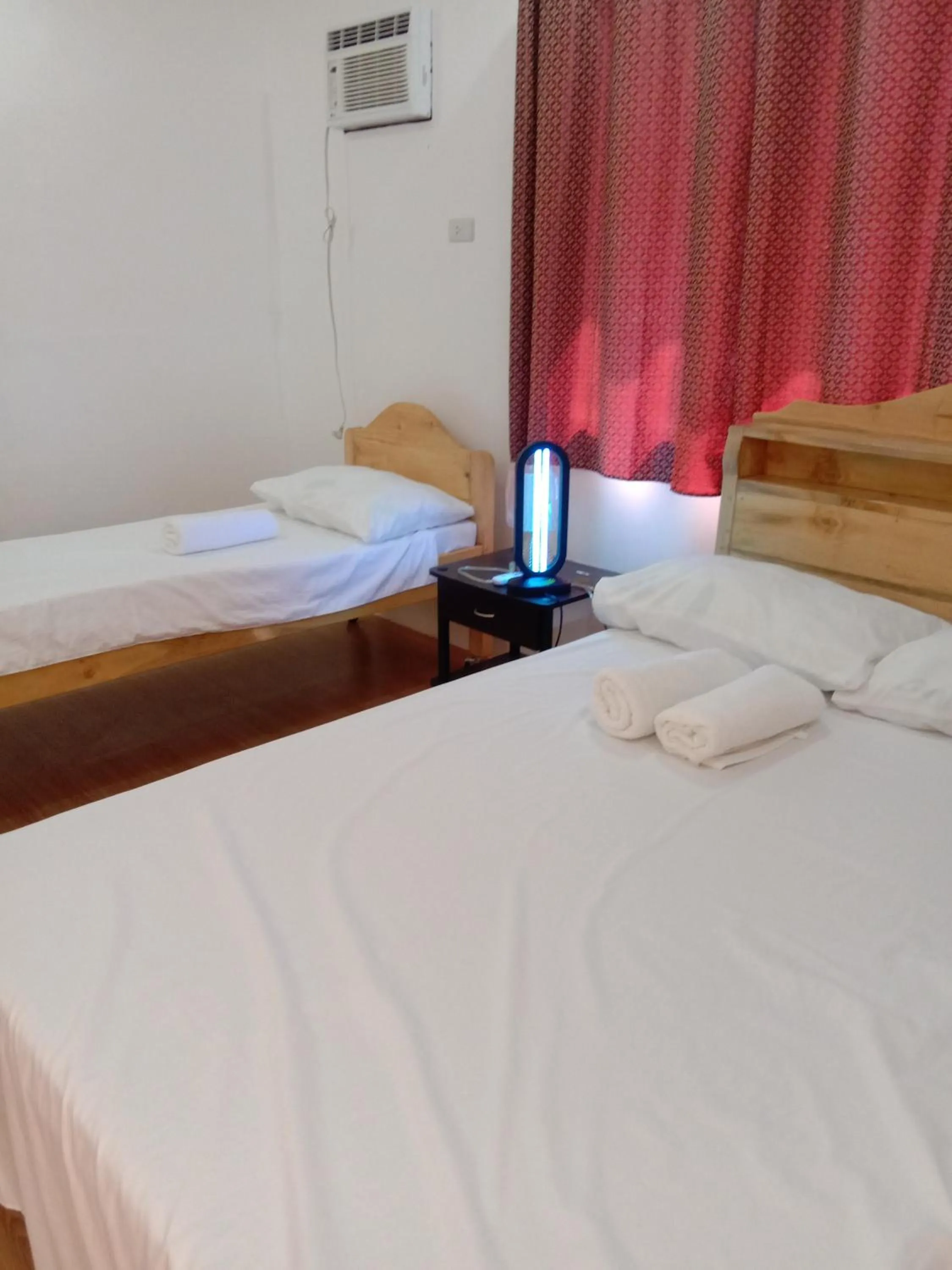Bed in RNA Guesthouse