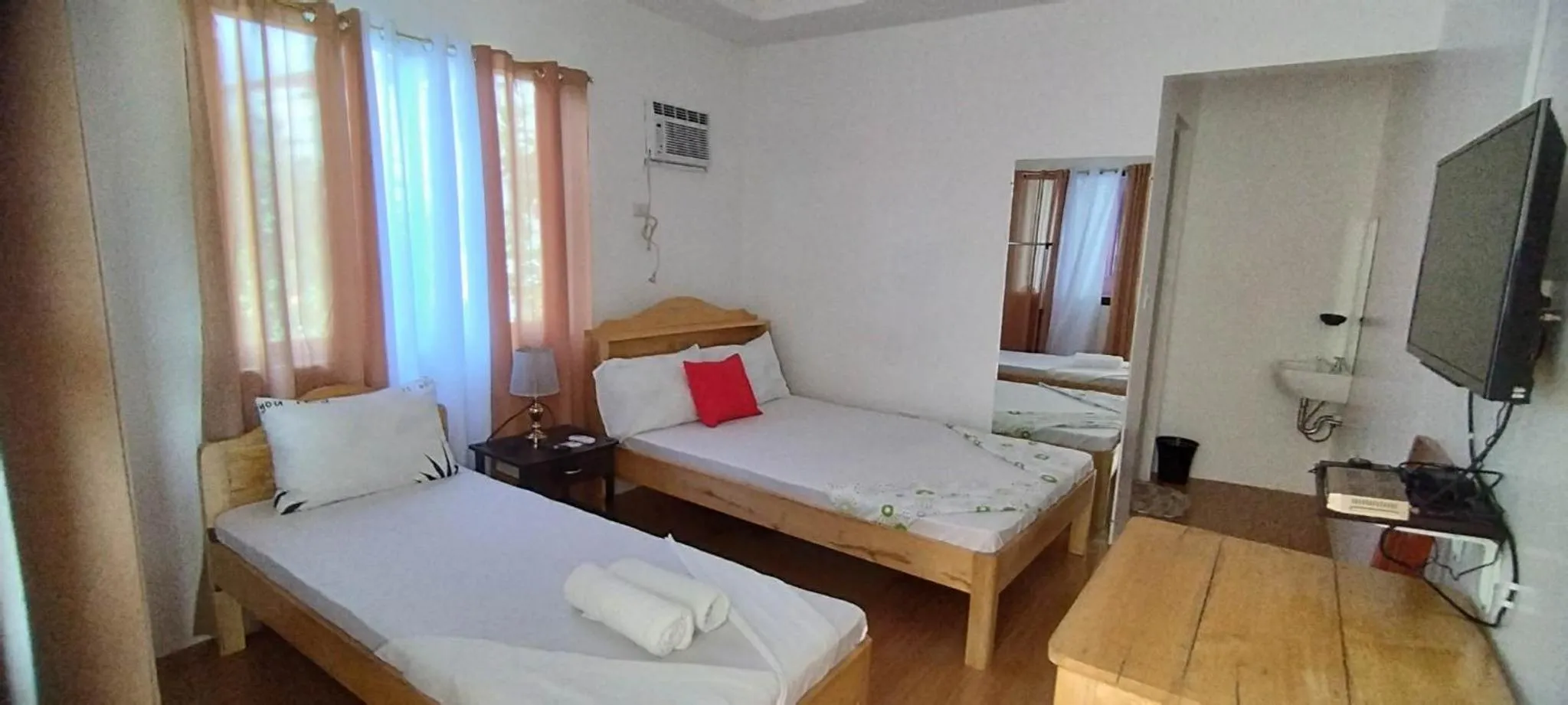 Bed in RNA Guesthouse