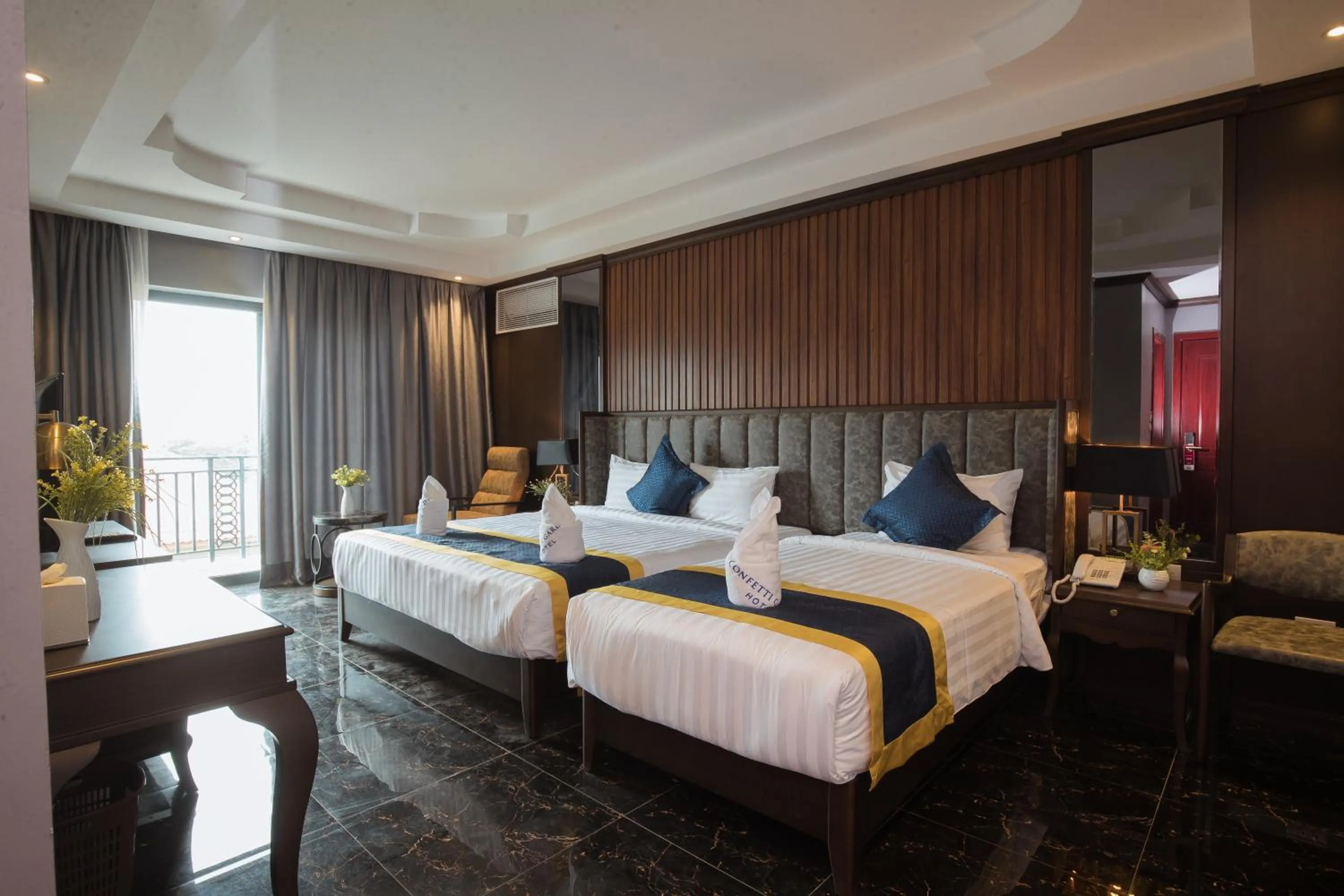 Bed in Confetti Garden Hotel