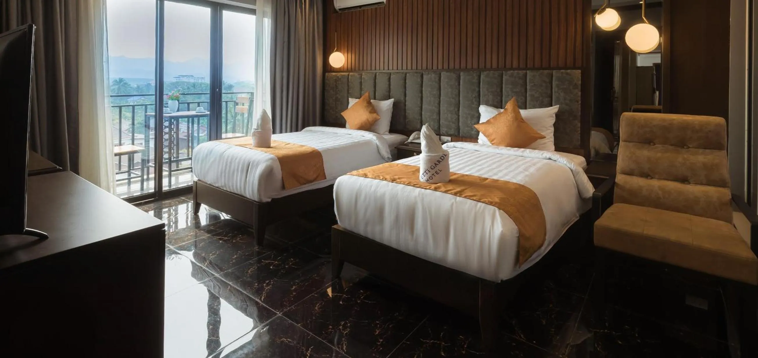 Bed in Confetti Garden Hotel