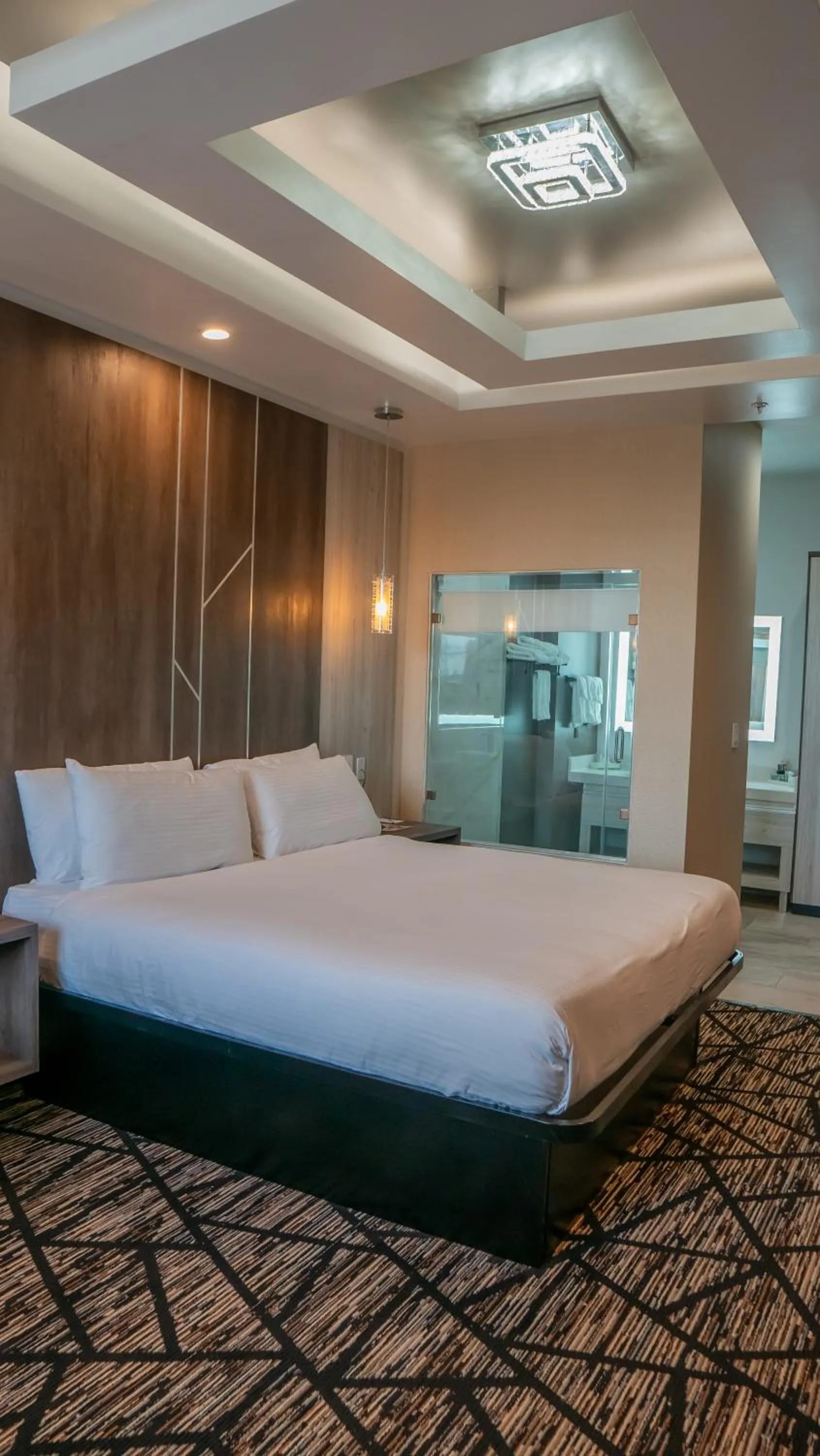 Bedroom, Bed in Comfeeni Inn and Suites