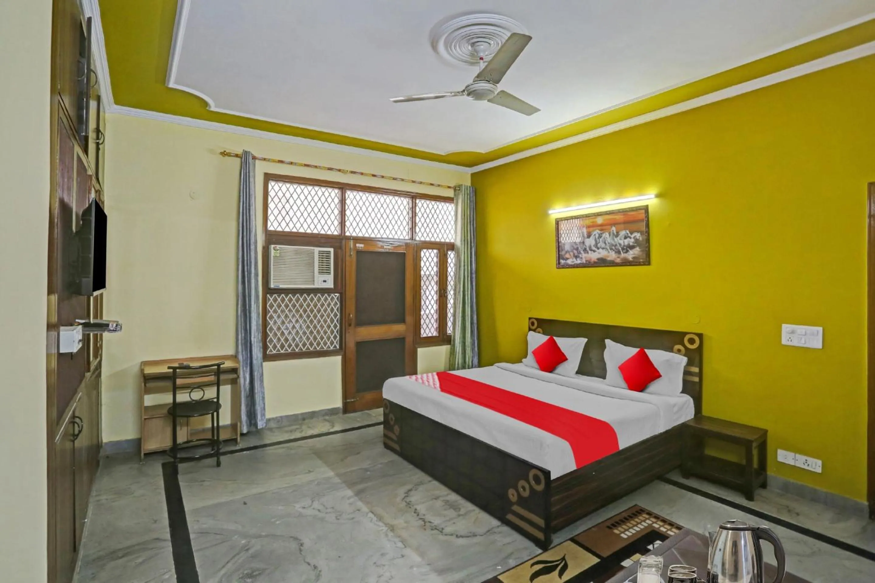 Bedroom in OYO Flagship 81046 Royal Retreat