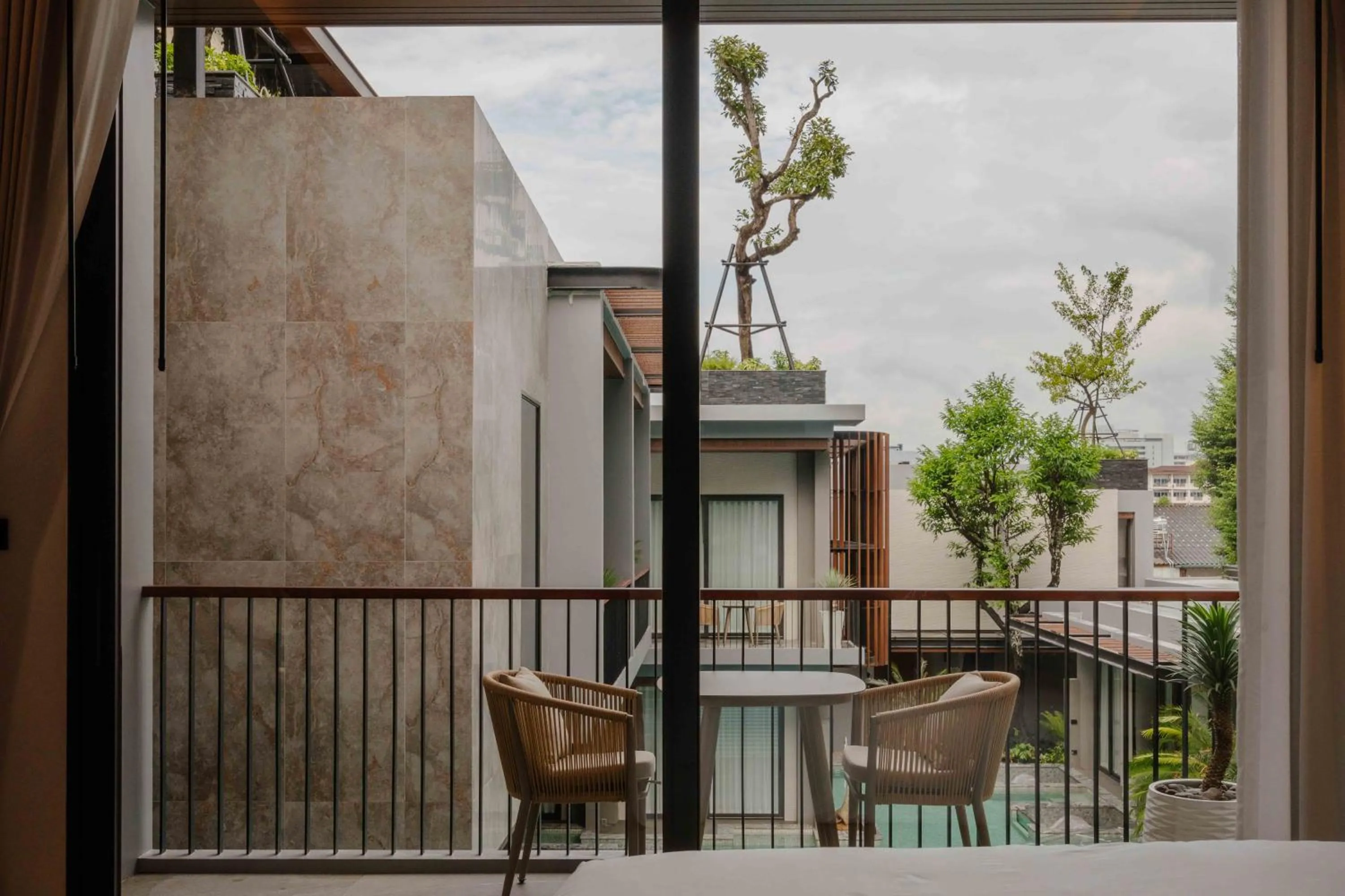 Upper Room with Pool View in Richmann Resort Hotel Hatyai