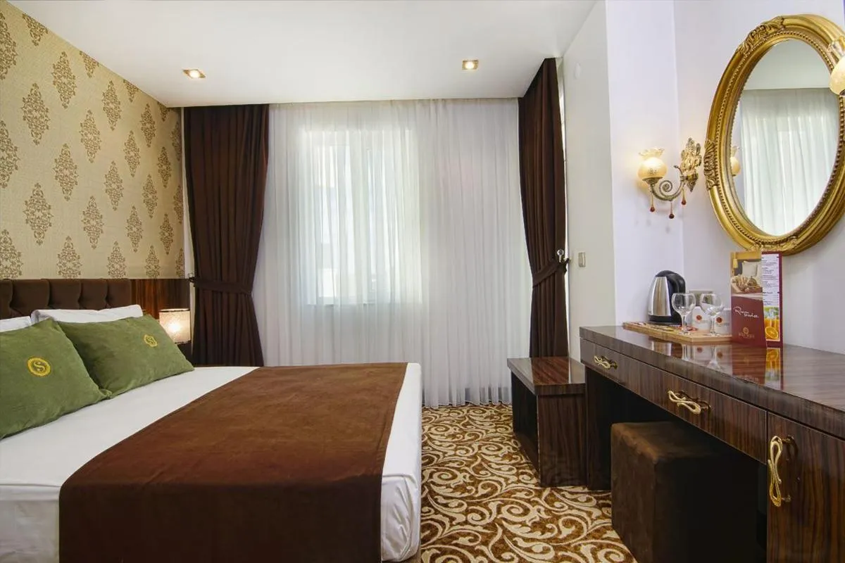 Bed in HOTEL S WHITE