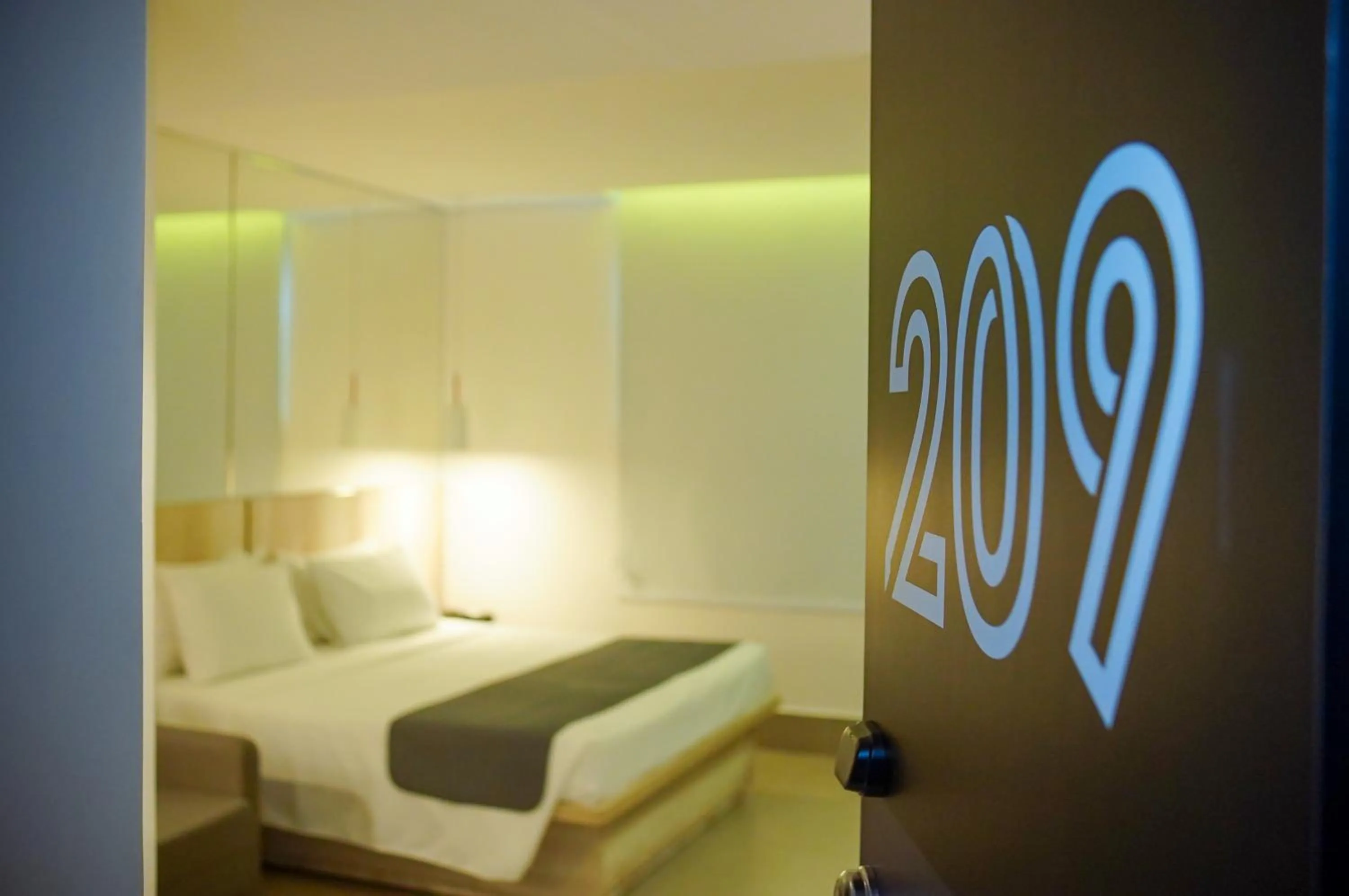 Bed in Hotel Black Inn Flamboyant