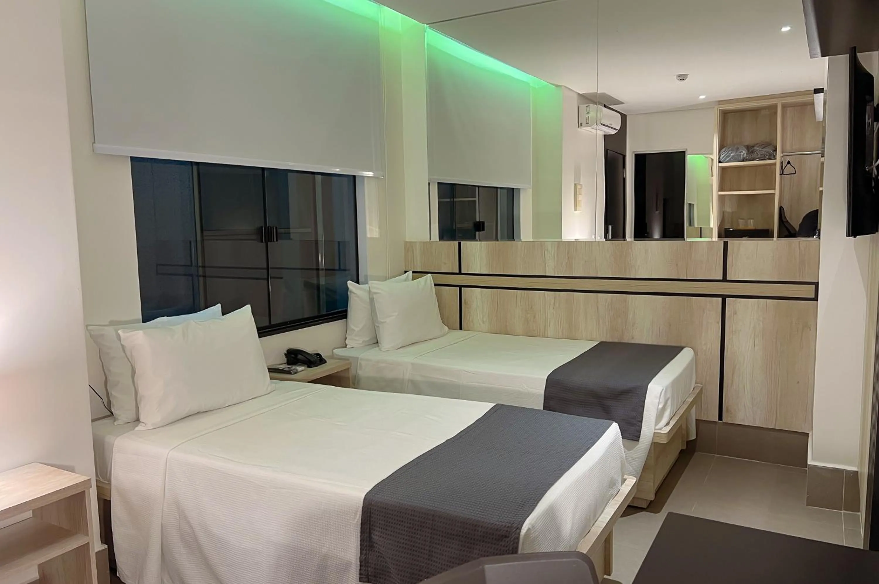 Bed in Hotel Black Inn Flamboyant