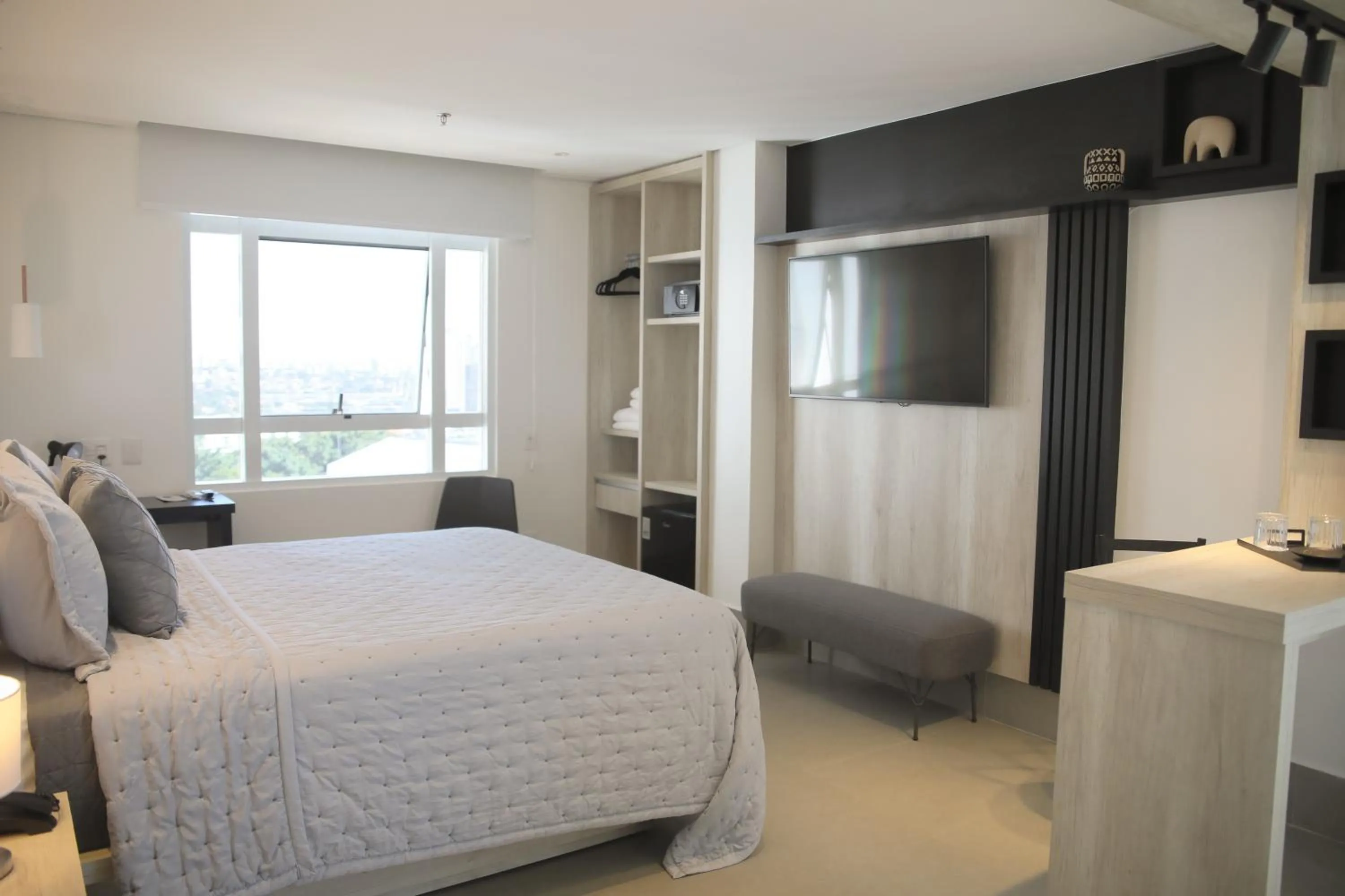 Bed in Hotel Black Inn Flamboyant