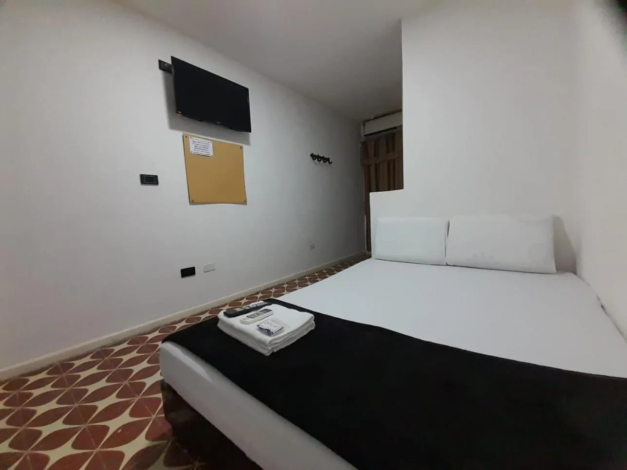 Bed in Hotel Tamaiti