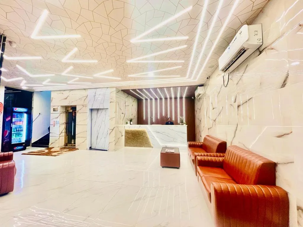 Seating area, Bed in Hotel Eagle Grand Airport Zone