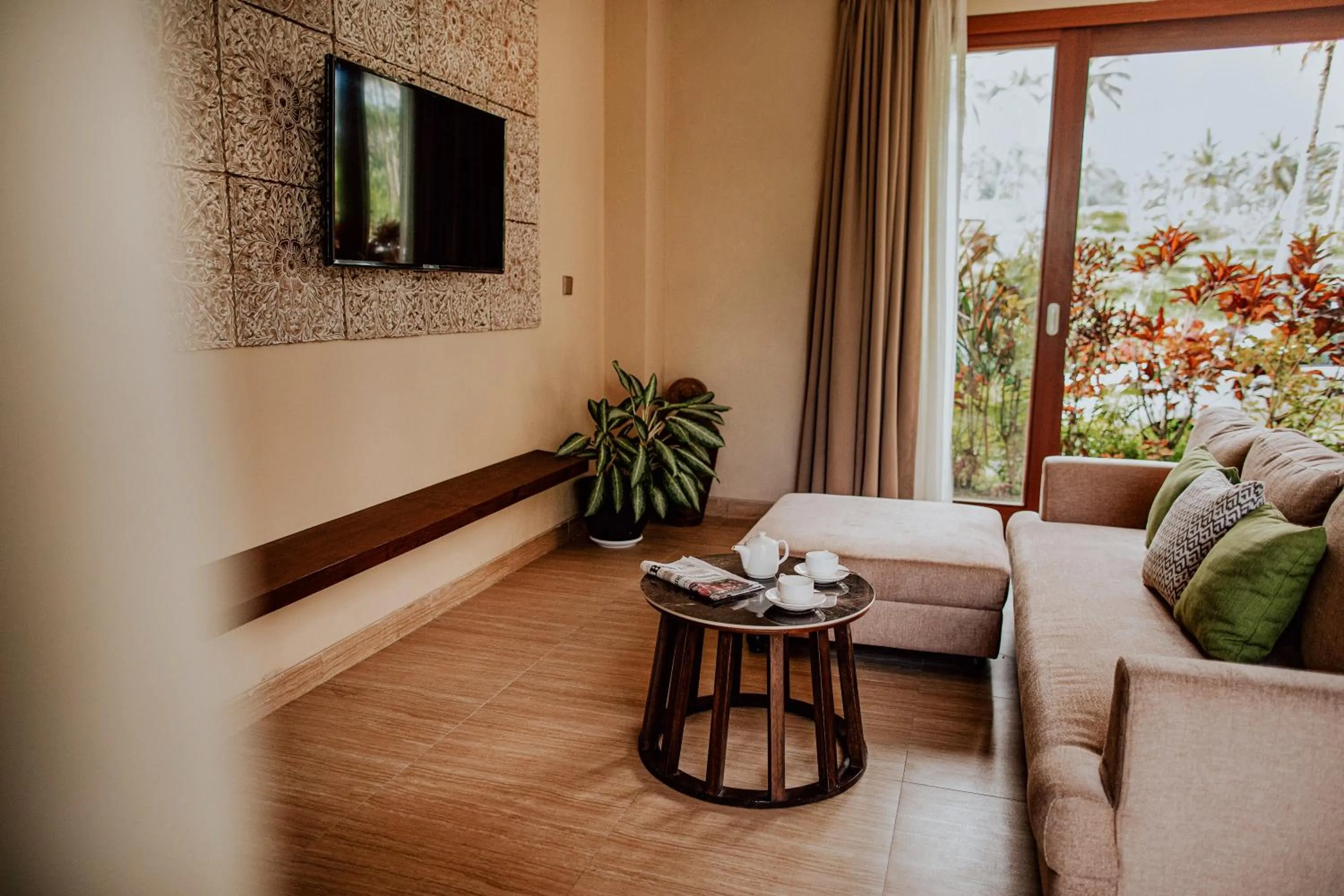 Communal lounge/ TV room in Stanagiri Villas Ubud