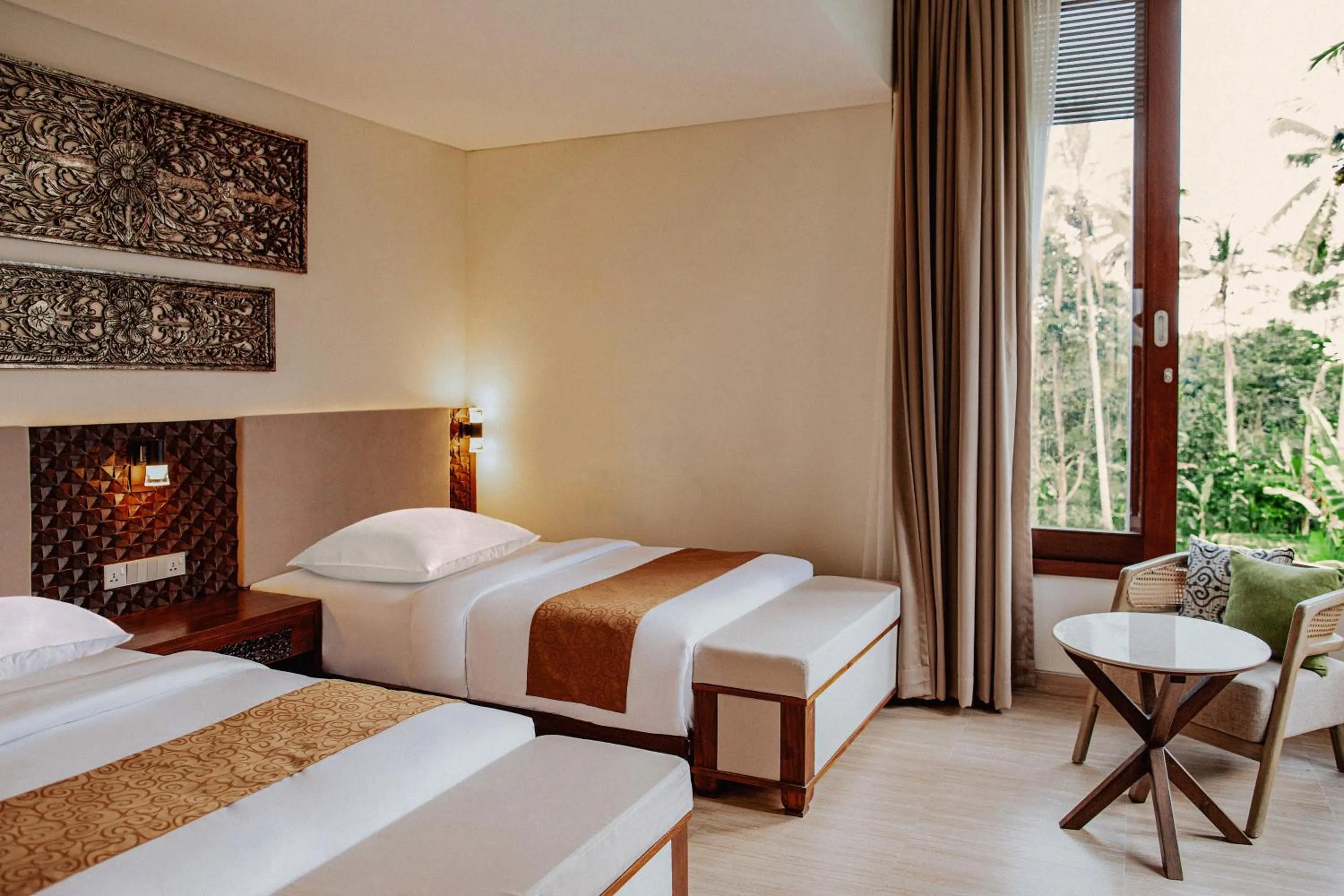 Bed in Stanagiri Villas Ubud