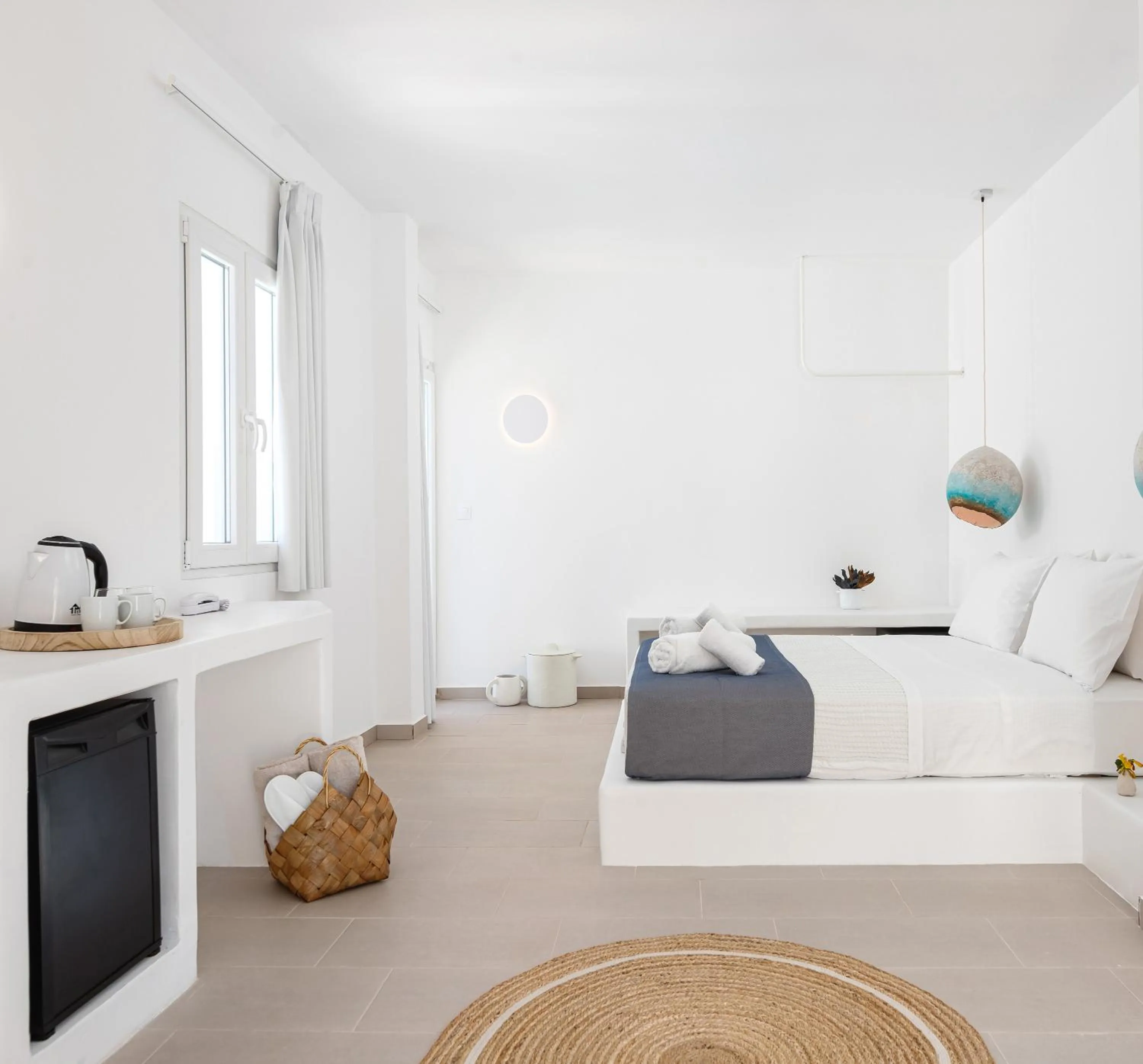 Bed in VOCA HOTEL & SUITES